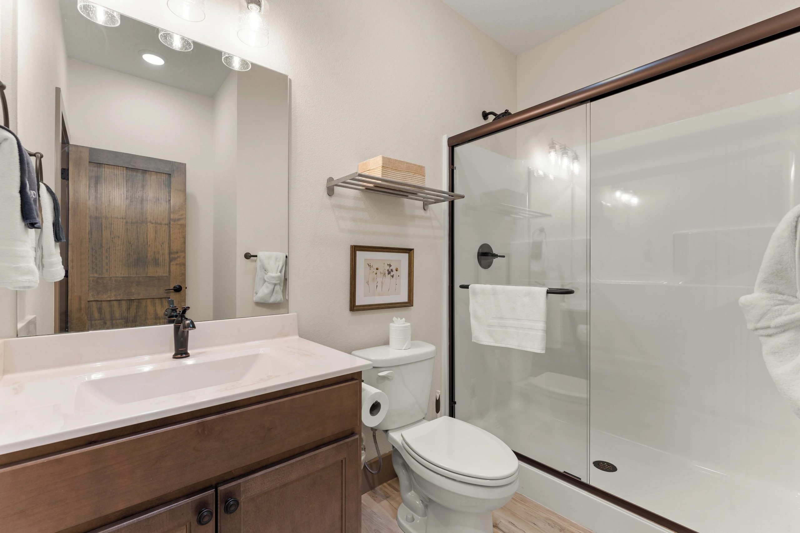Ensuite for upstairs bedroom with king bed. walk in shower.