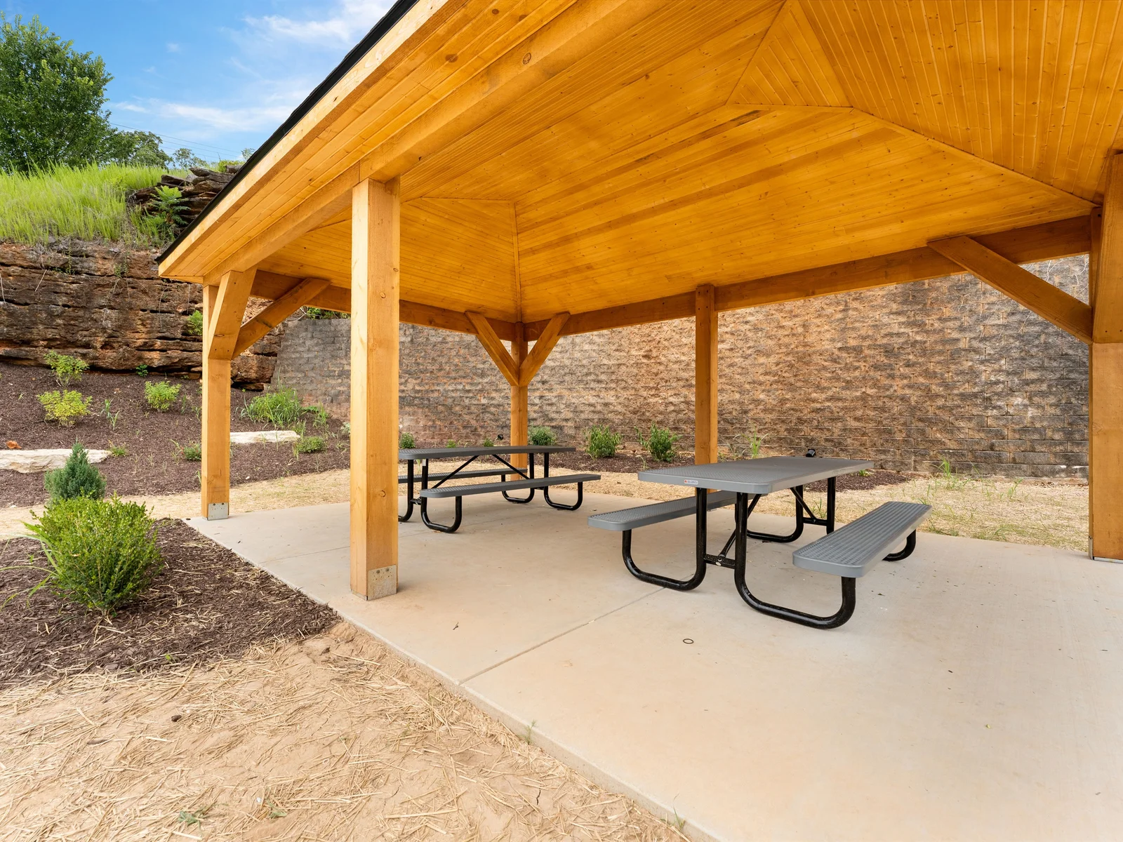 Pull up to the new pavilion for your family cookout — covered area, grill ready, picnic tables set up for the whole group. This is where your Branson afternoons end after the pool time.