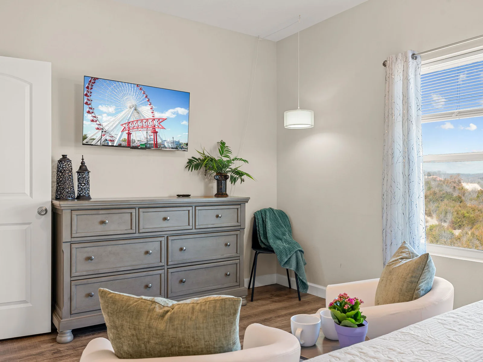 Steal away to the primary en suite sitting area — your own mountain-view retreat within the retreat. While the kids are in the game room, this is where the parents actually recharge.