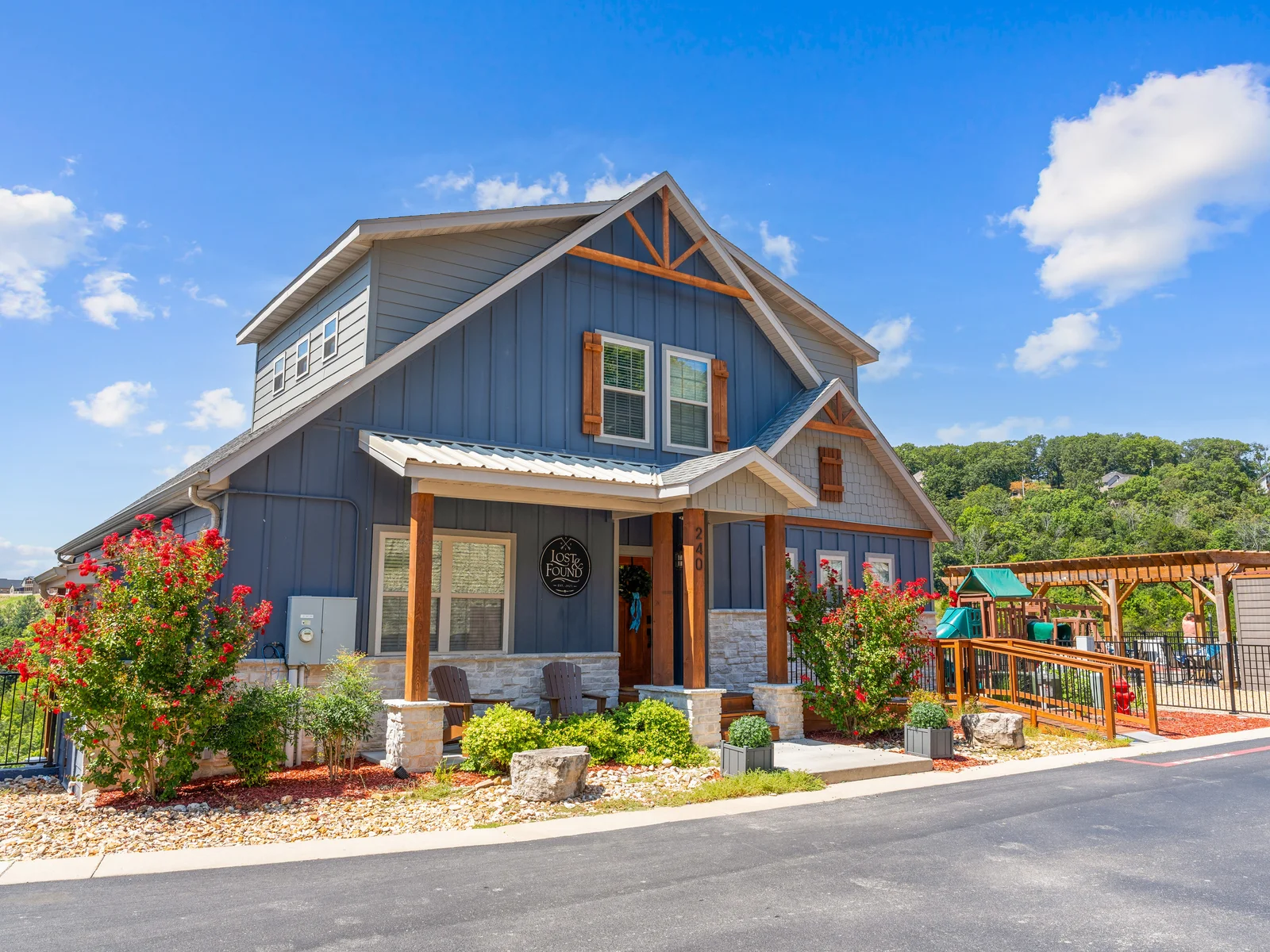 Front of lodge. Right next to playground and outdoor pool!
