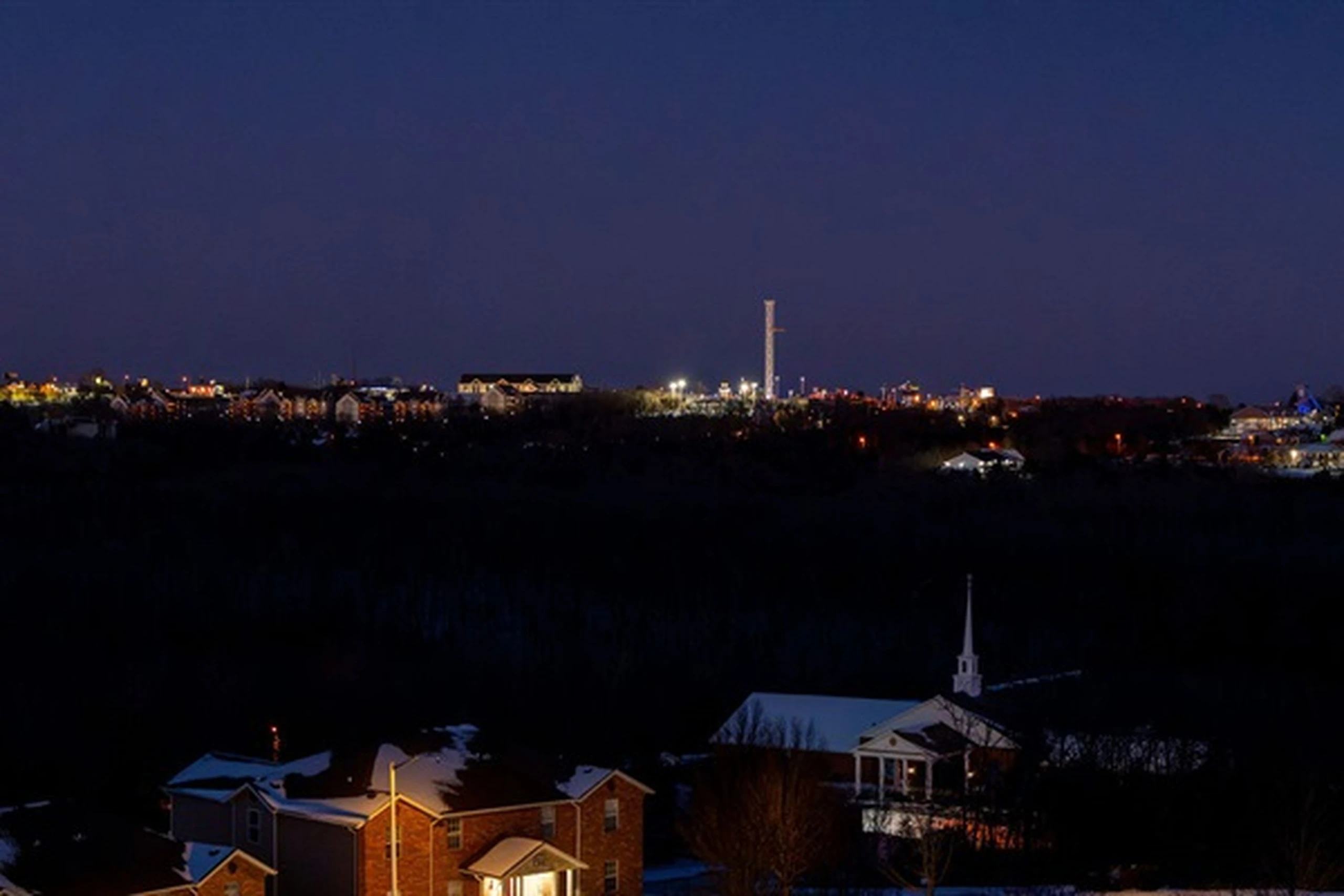 Grab a drink on the balcony and watch the whole city light up — your front-row seat to Branson at night