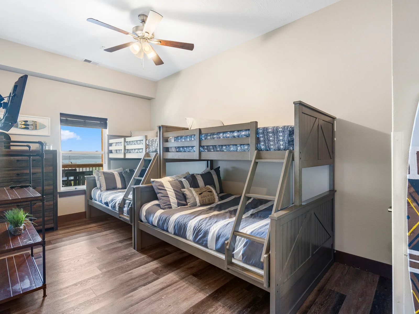 Lower level two sets of twin over full beds. Bathroom connecting this room and hall.