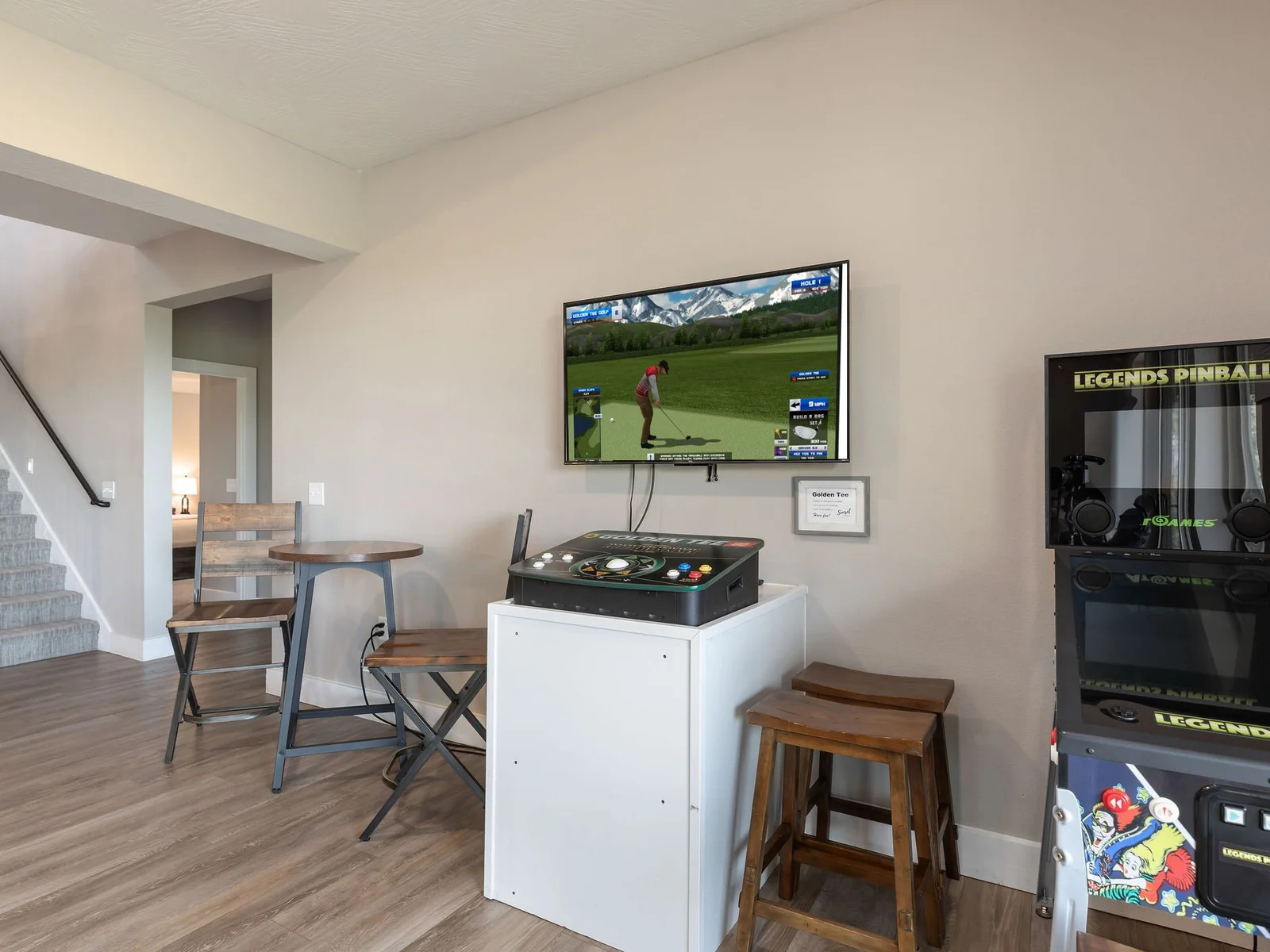 Challenge the family to a golden tee game or some virtual pinball!