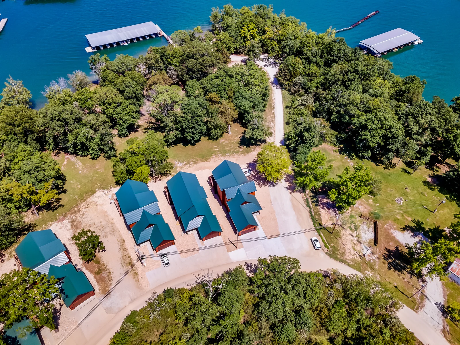 Last lodge in the development located next to the road that leads to a boat dock