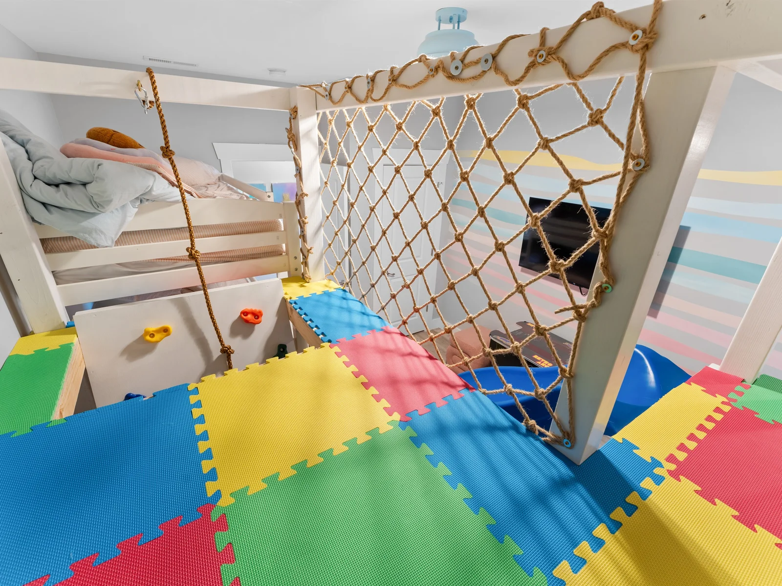 Who can you see coming into the play area from up here?
