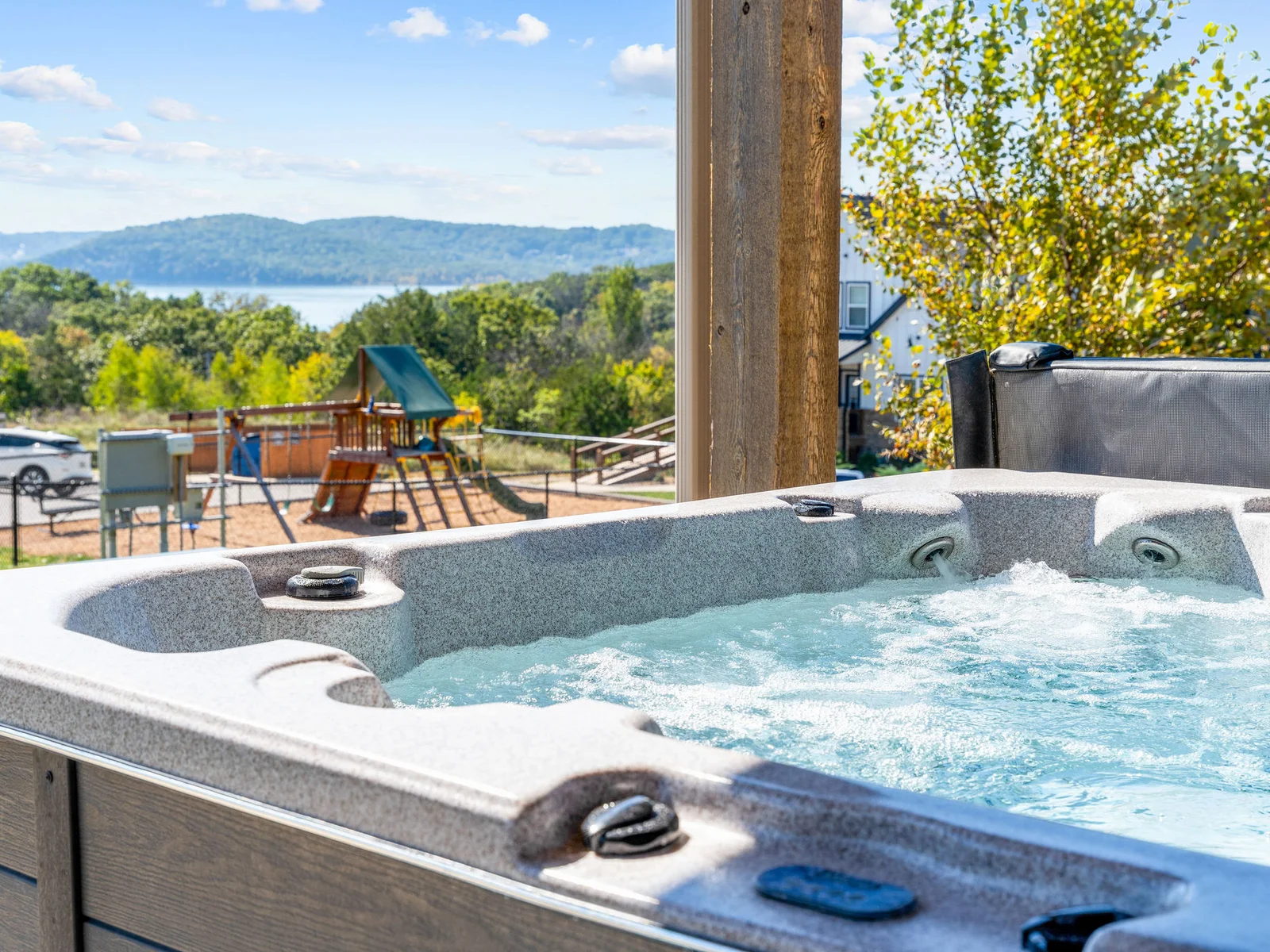 Jump in the hot tub after getting out of the community pool steps away!