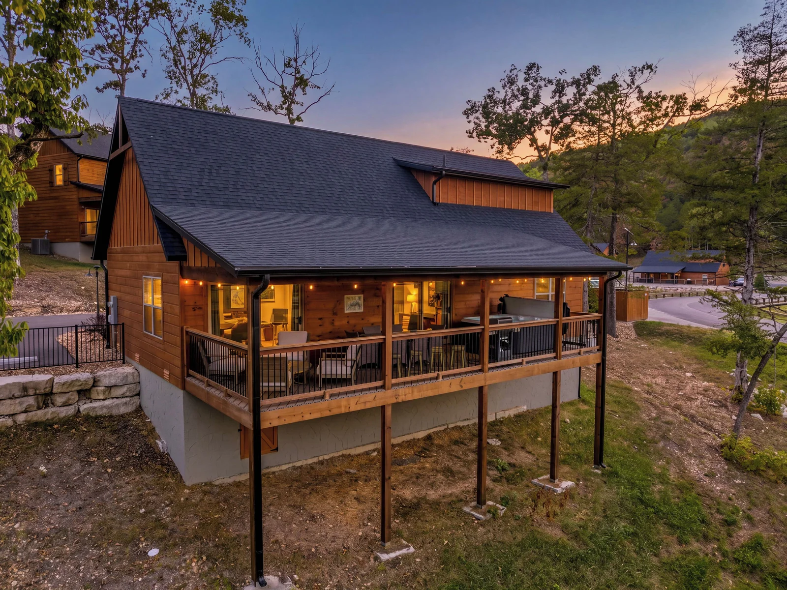 Back view of deck, very private feel, only a ravine below you.