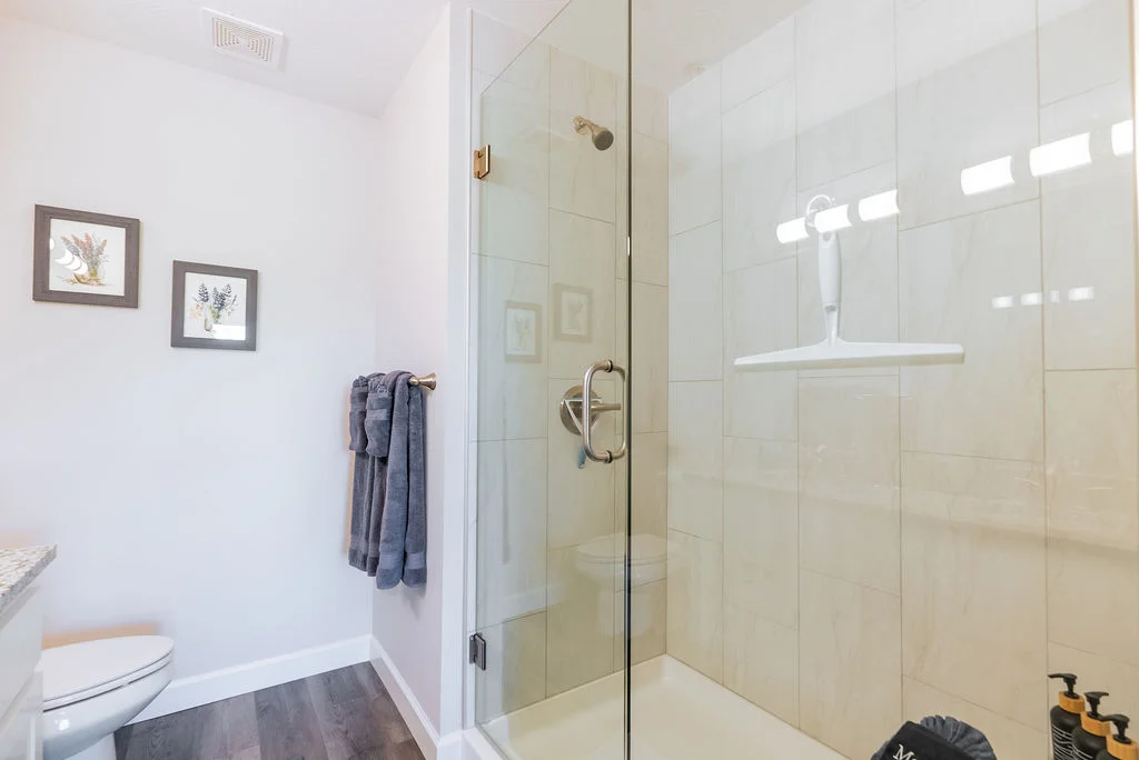 Primary bath with full shower and complimentary toiletries