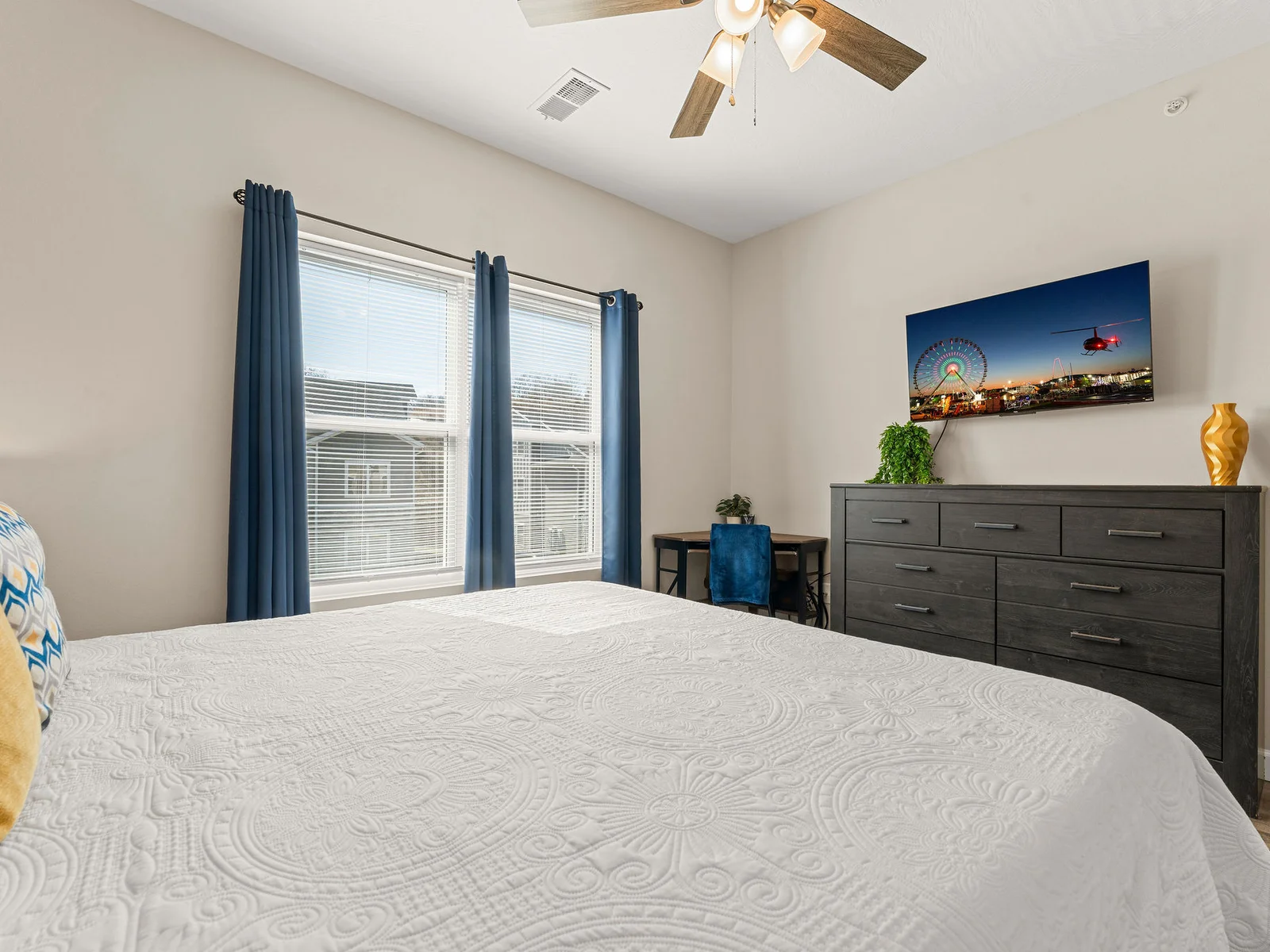 Settle in properly — the large king bedroom has a real workspace desk, walk-in closet, and room to spread out.