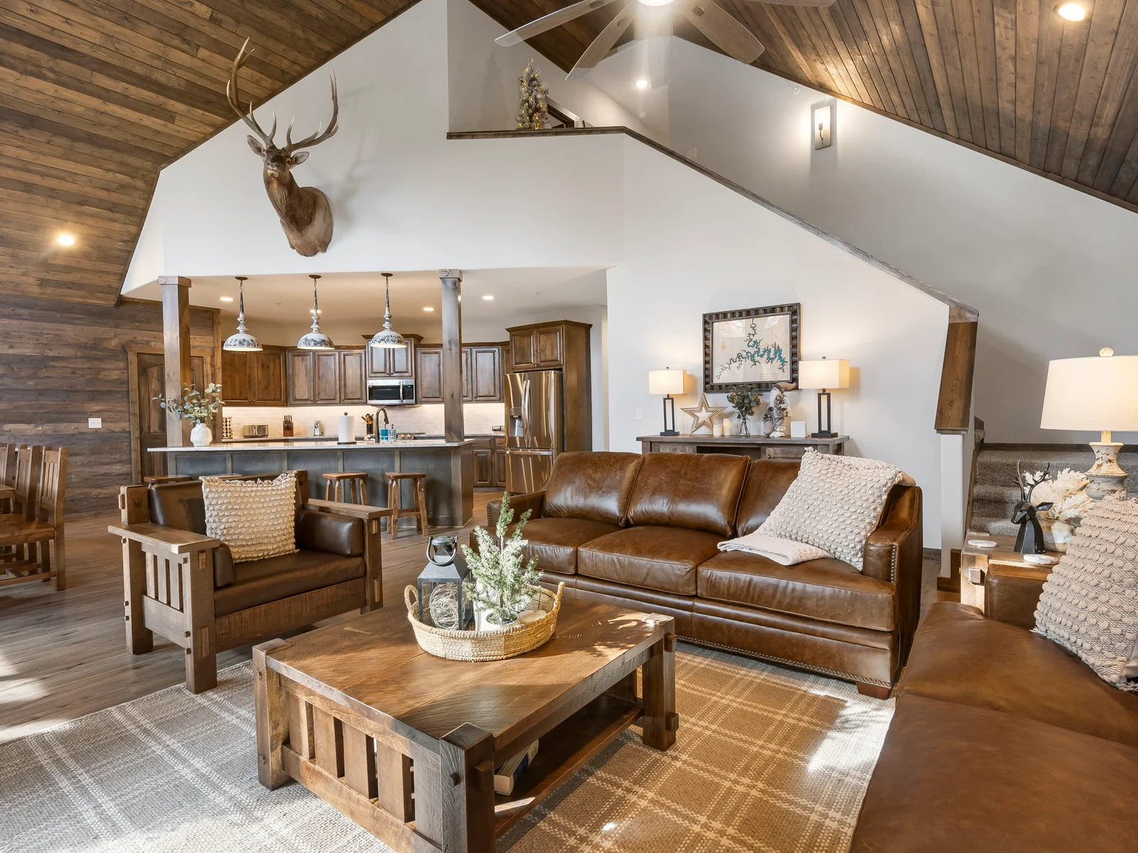 Vaulted living, kitchen, and dining spaces