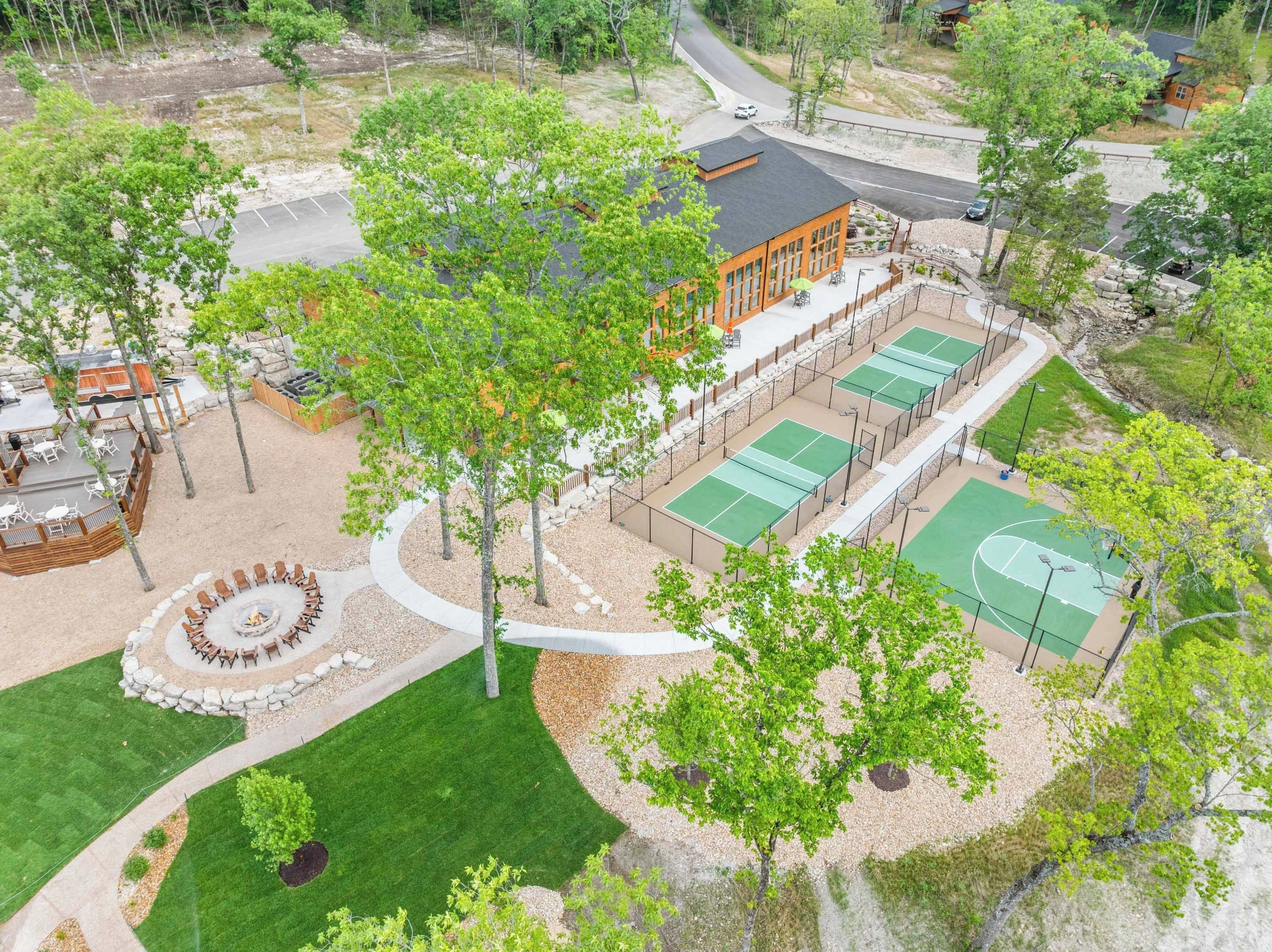 Proximity of Indoor pool, sports courts, and community firepit.