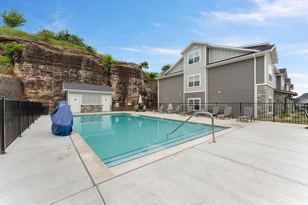 Step outside, turn right, you're here. Roughly twenty seconds from the front door to a lounge chair. No walking across a parking lot. No long hallways. Just outside.