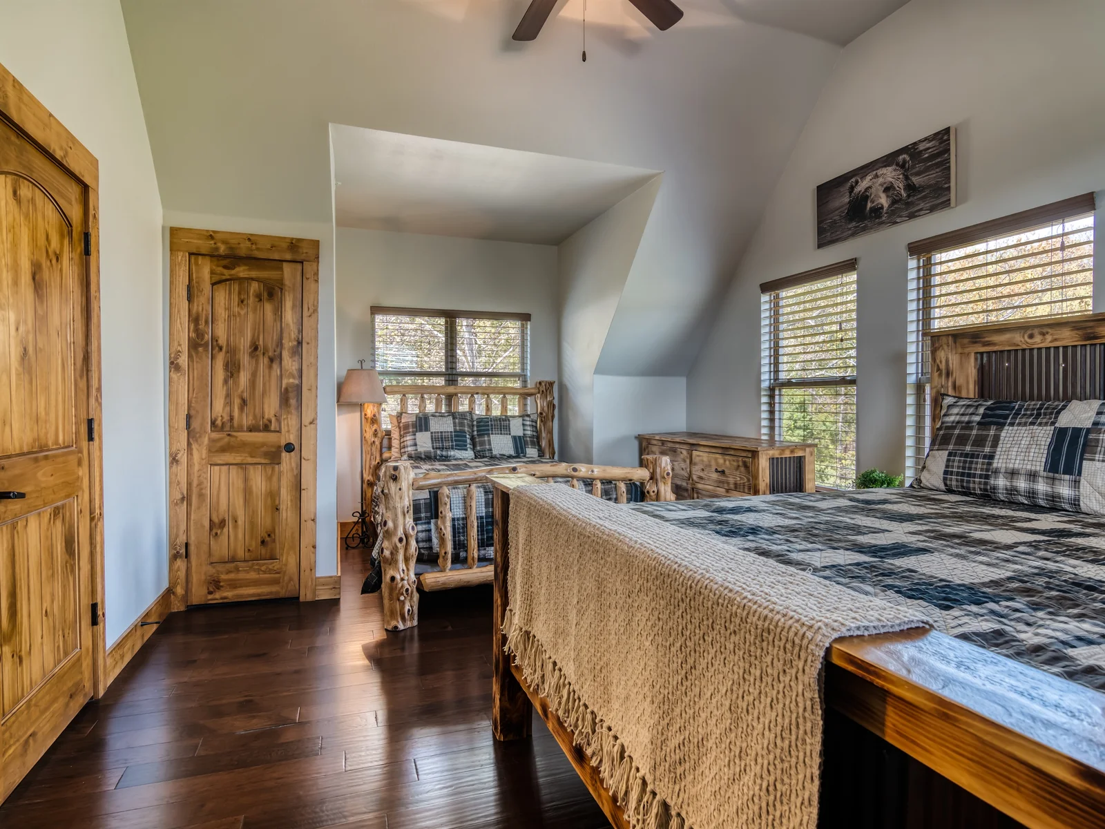 The two upper bedrooms each have King and a Queen bed in each room!