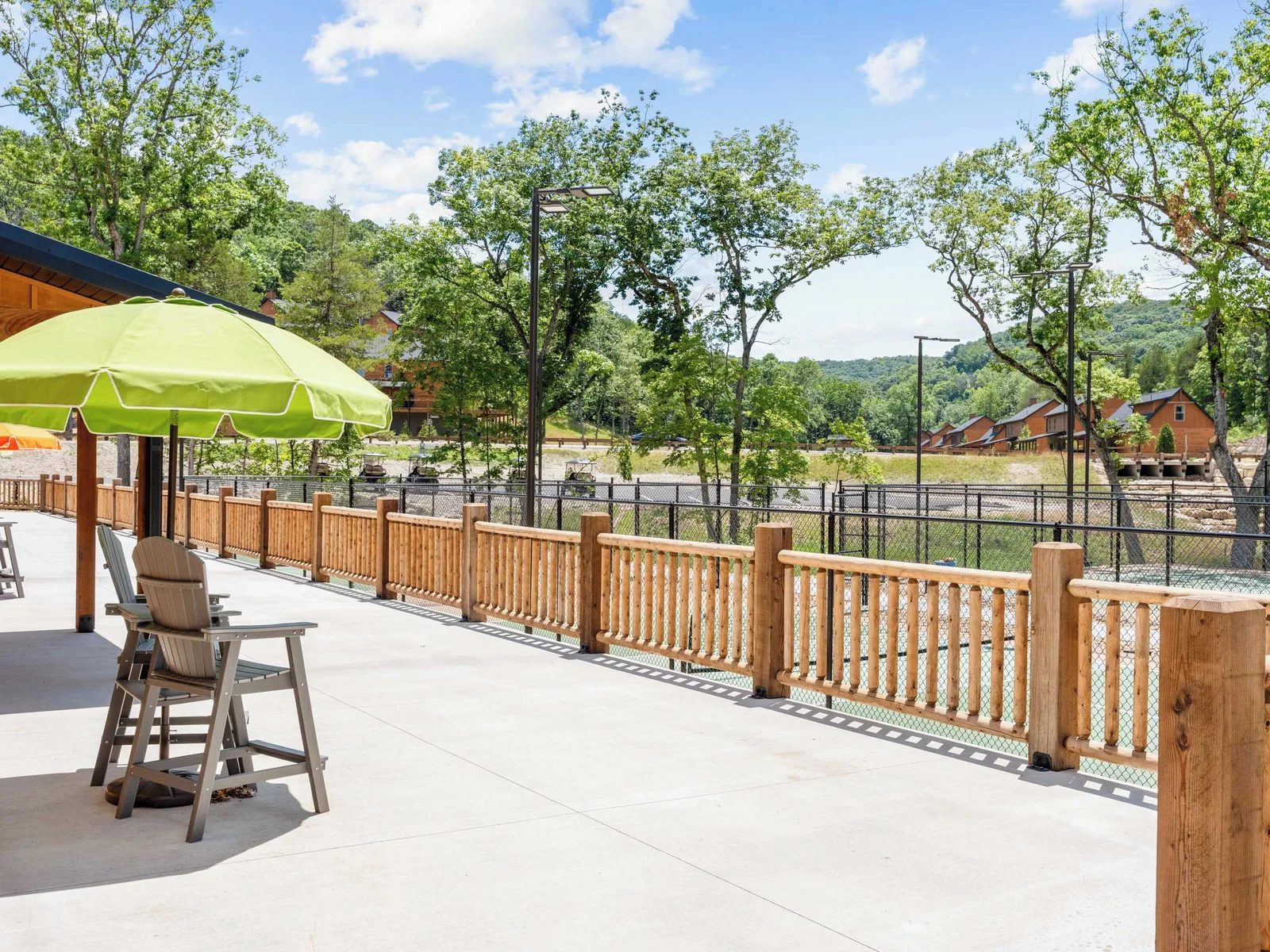 Seating area overlooking the sports courts near the indoor pool.