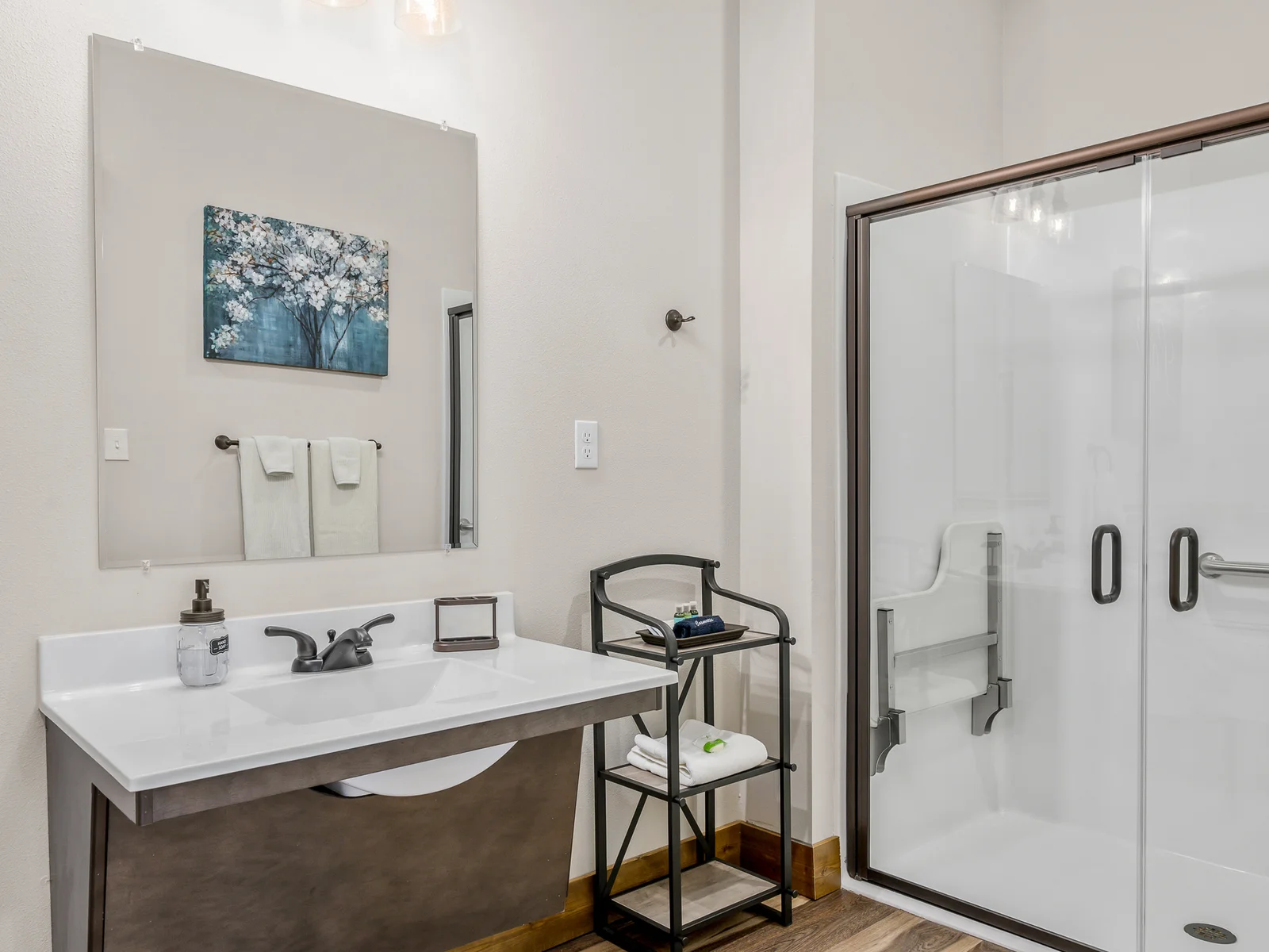 Marilla Cuthbert ADA accessible bathroom with grab bars and wheelchair friendly sink