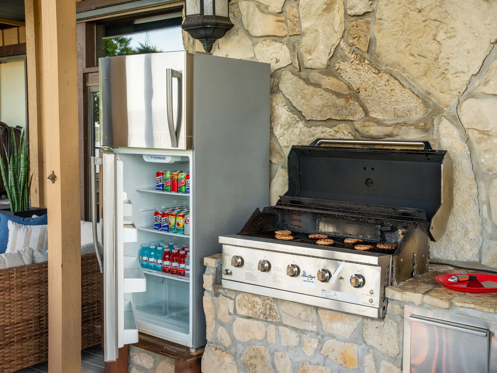 Fire up the grill and enjoy outdoor cooking in this rustic grilling space made for group meals and summer nights.