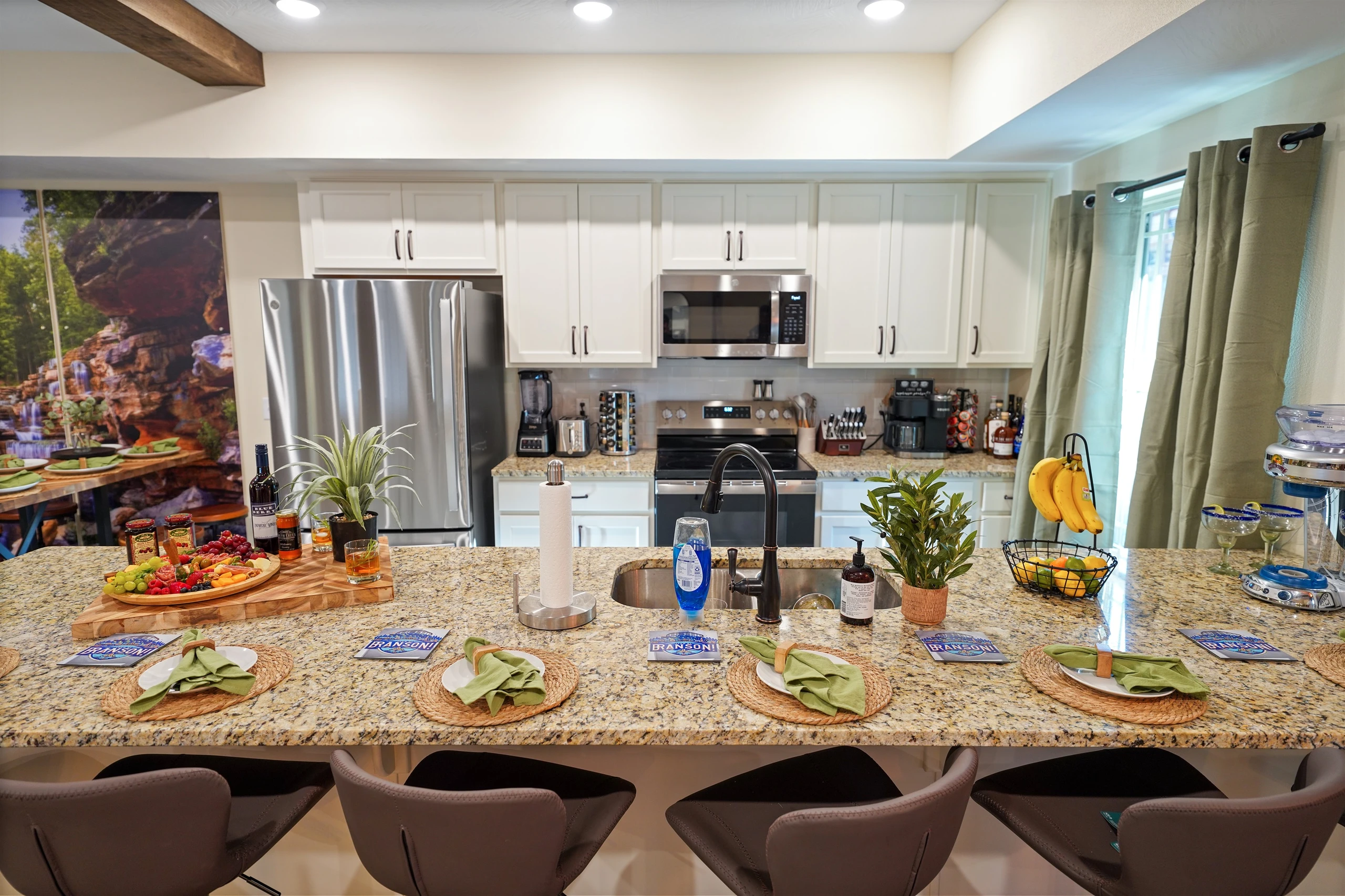The fully stocked kitchen is perfect for preparing a meal and staying connected with everyone