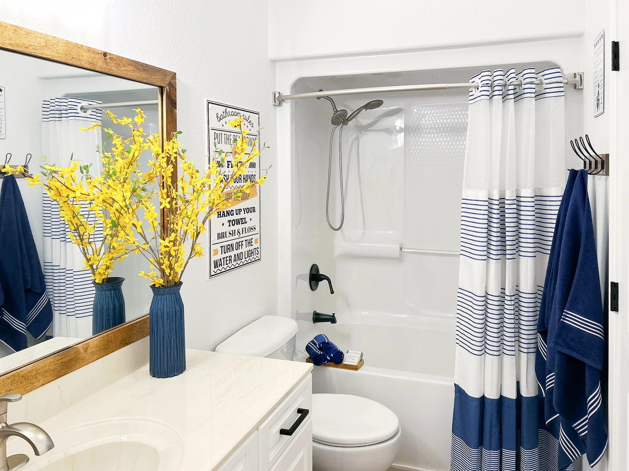 With a large vanity and a shower spa/tub combo.