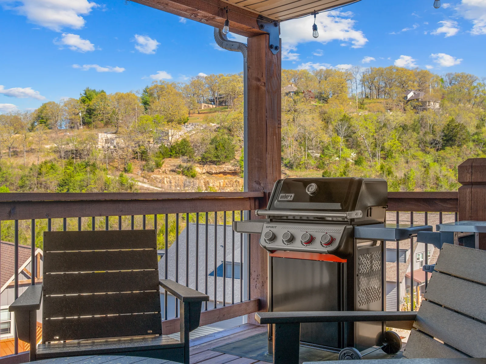 Weber propane grill with large prep station.