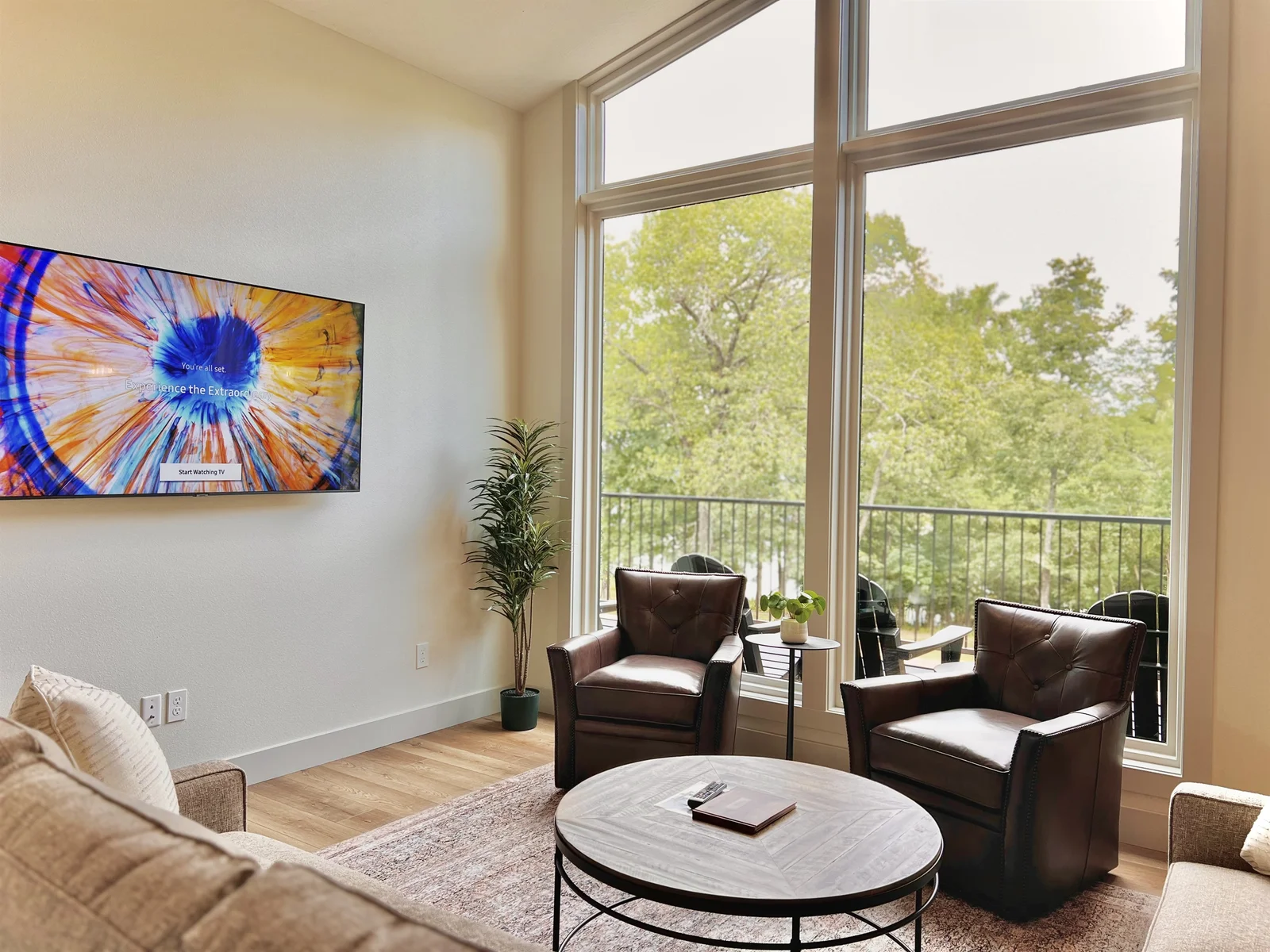 Upstairs living room with large windows for the best viewsn and Smart TV