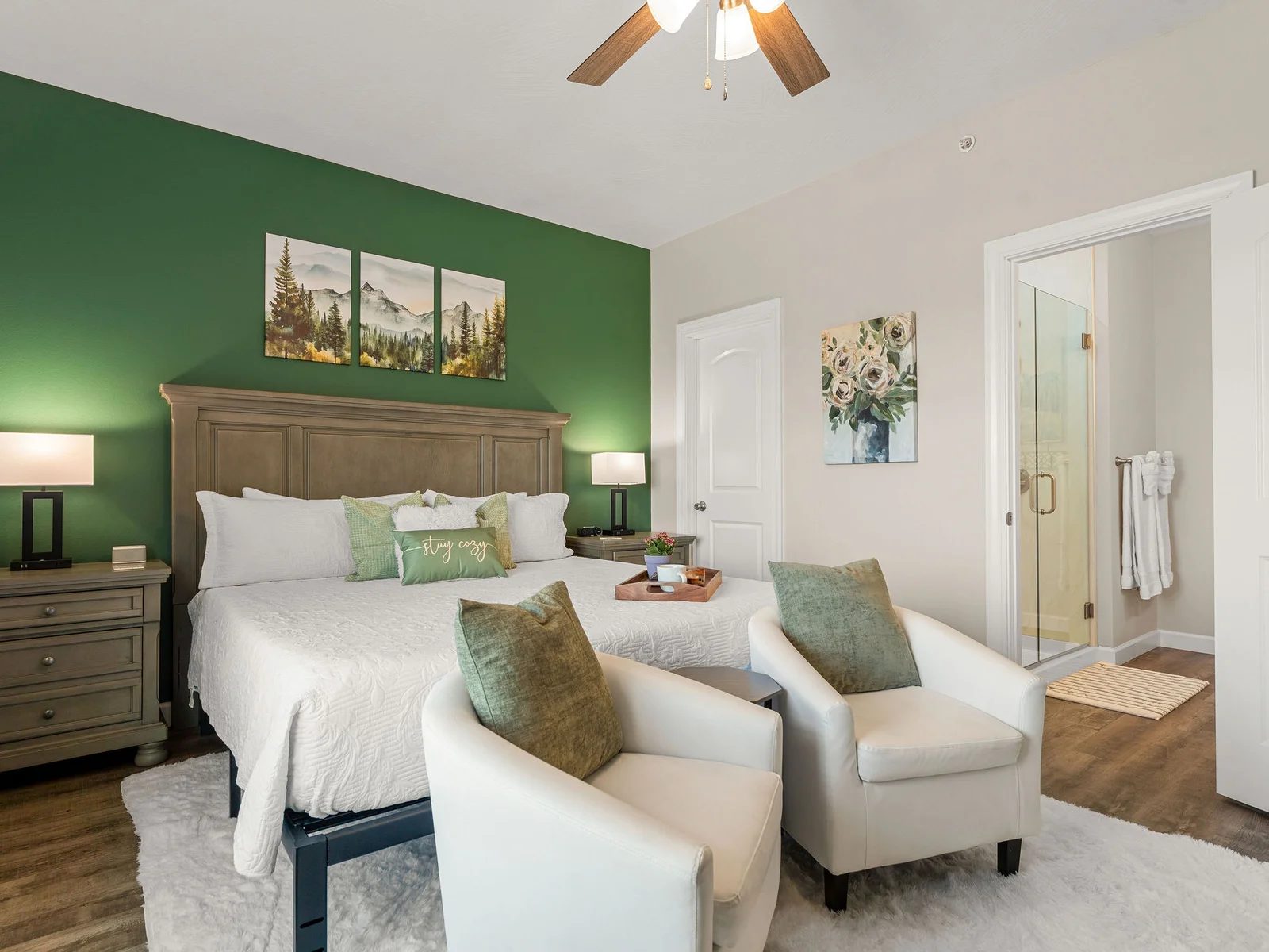 Find walk-in closet space, USB charging on each bedside table, Smart TV, and a white noise machine — your primary bedroom retreat.