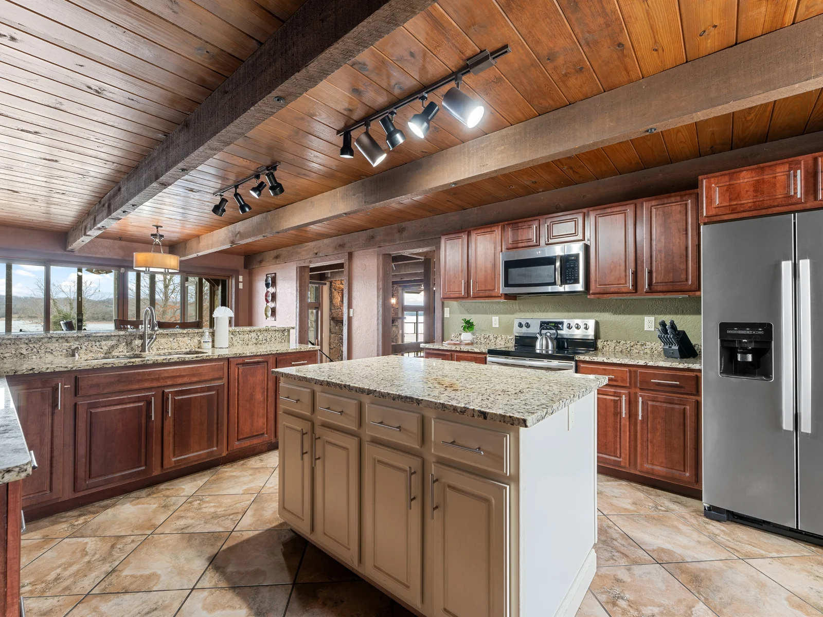 This spacious, fully equipped kitchen makes it easy to cook together, linger over meals, and enjoy the simple pleasure of being all in one place.