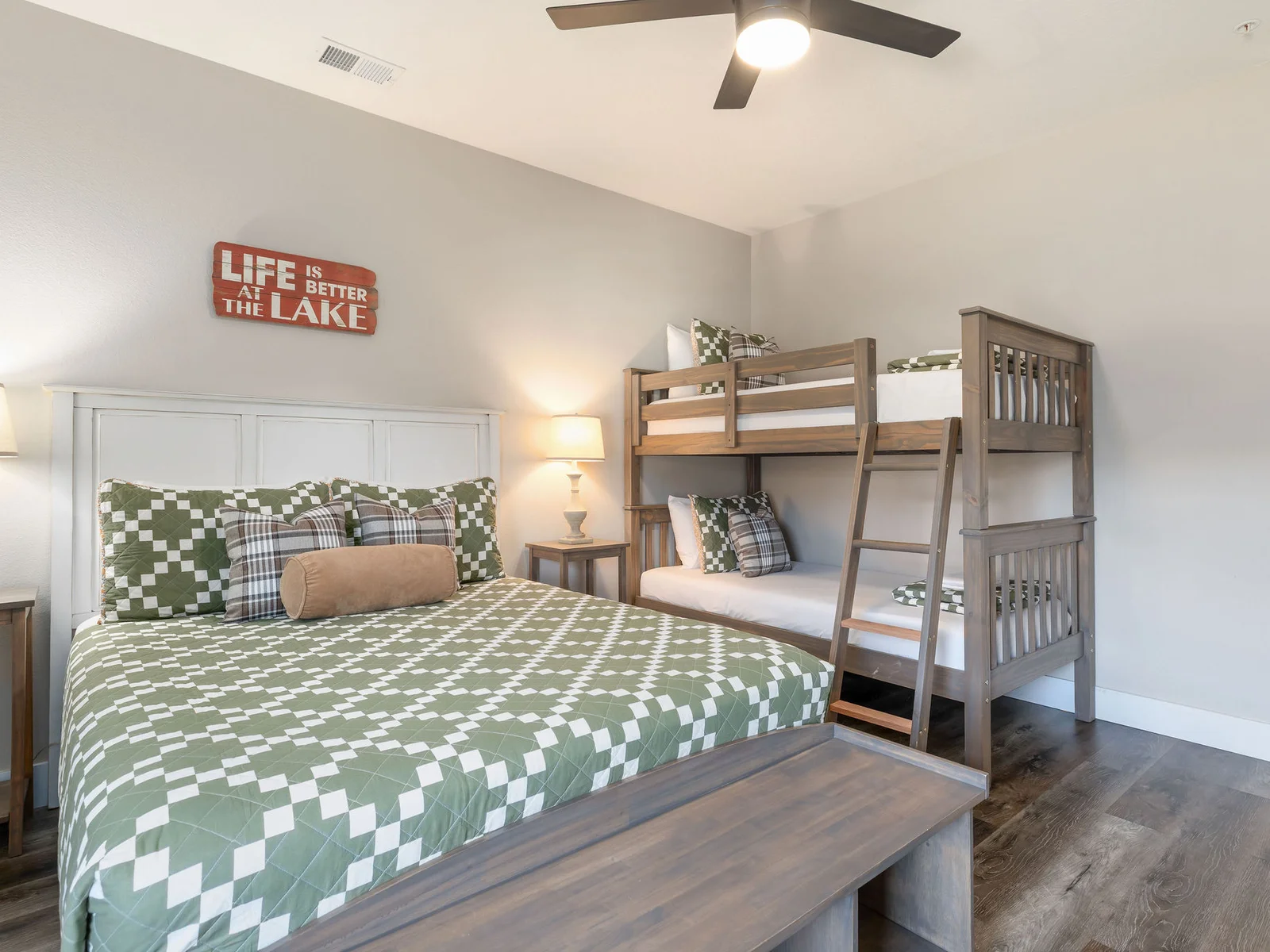 Lower level Queen bedroom w/ bunks and ensuite bath