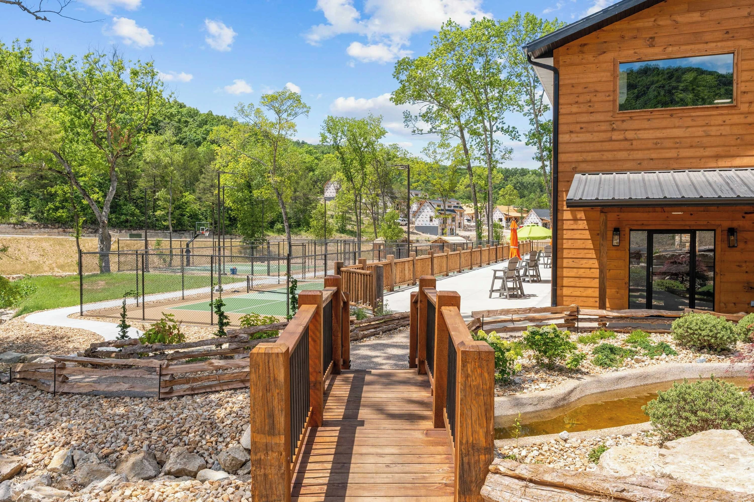 Enter the indoor pool area and sports courts here as you approach from the cabin.
