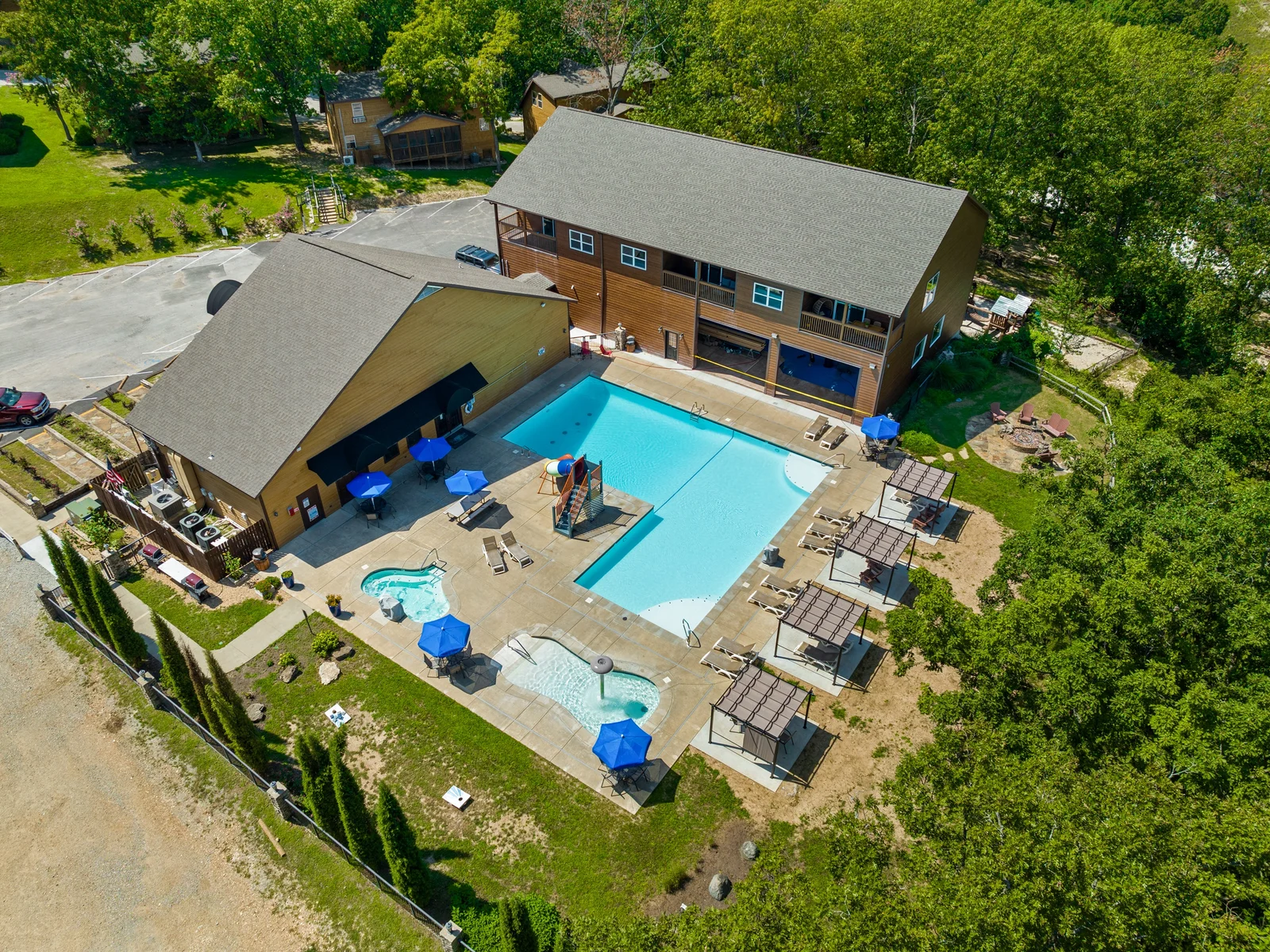 Outdoor Oasis: Dive into relaxation at our spacious pool area with cabanas and sun loungers!