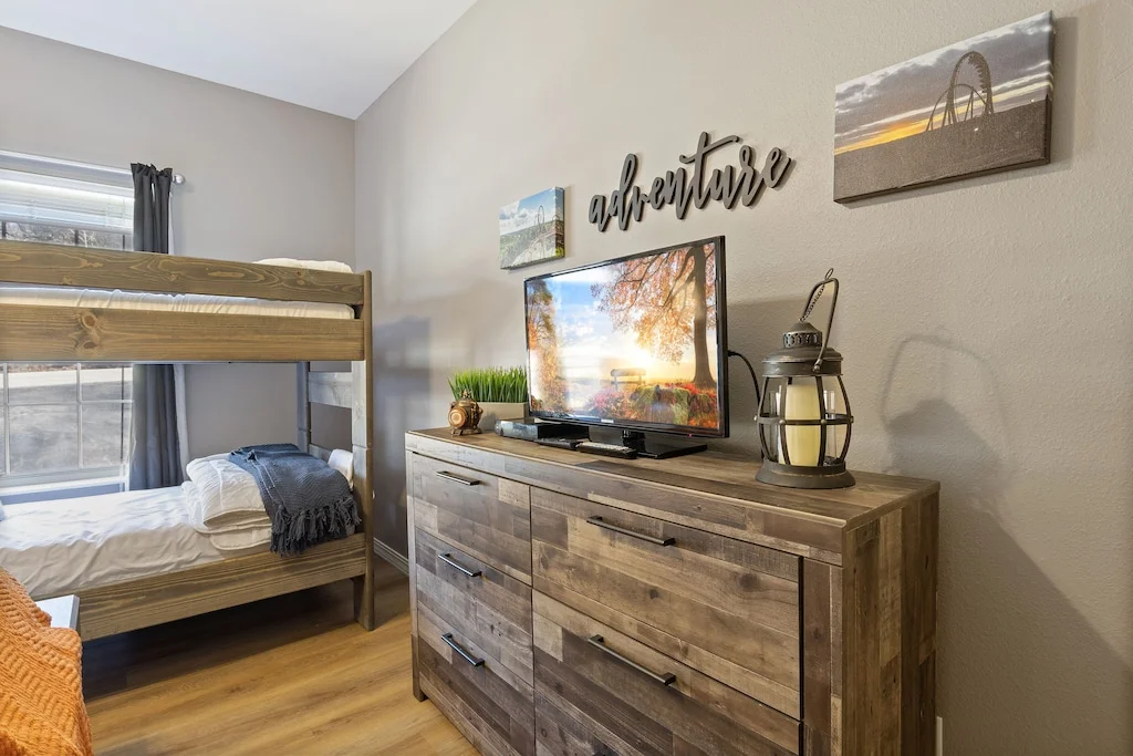 The Silver Dollar City room - full size dresser and flat screen TV