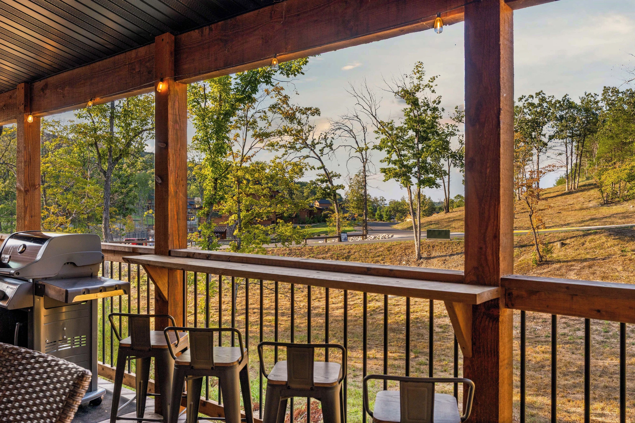 Outdoor deck, small bar with 4 stools for watching what is going on in the camp from the comfort of your private deck.