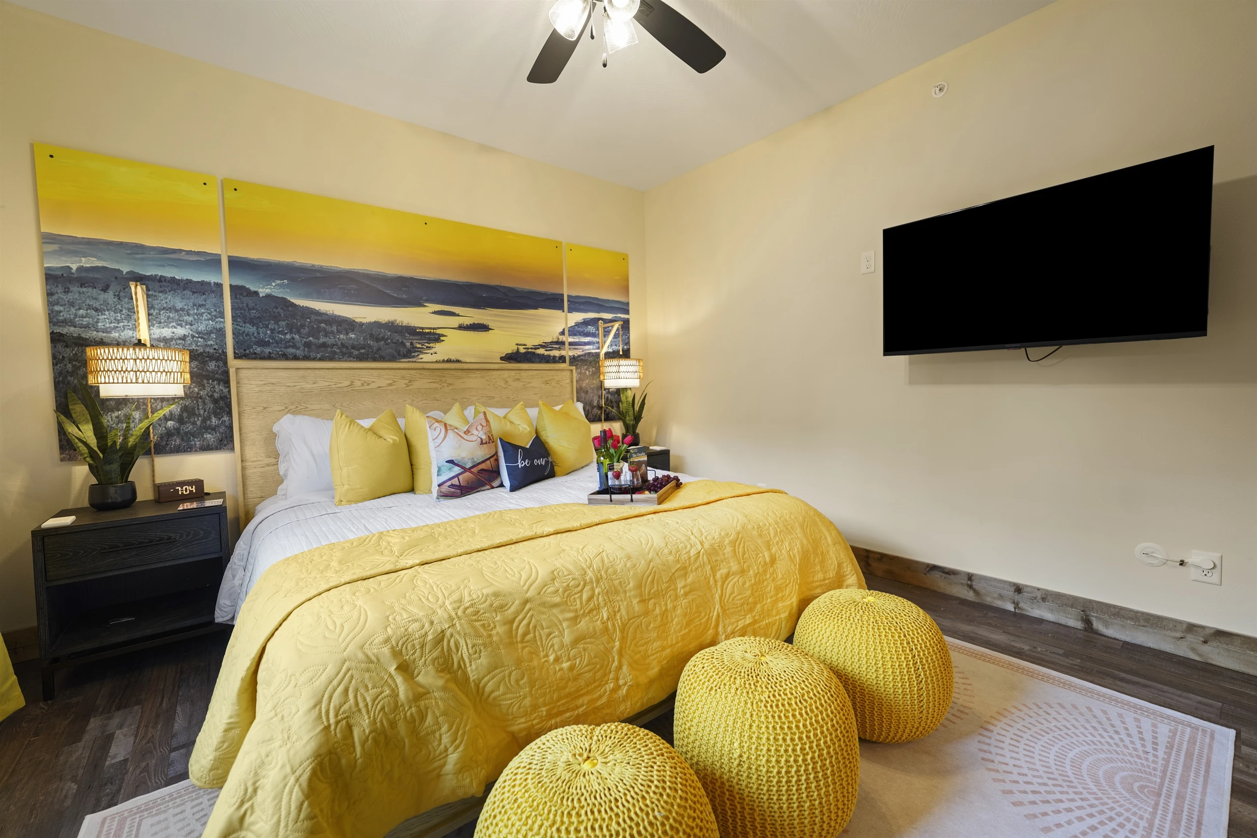 Large screen TV to enjoy a show or movie while relaxing in bed