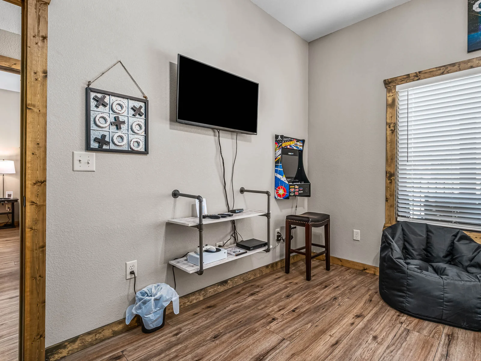 Bunkroom #1 has an Xbox one and wall mounted arcade game