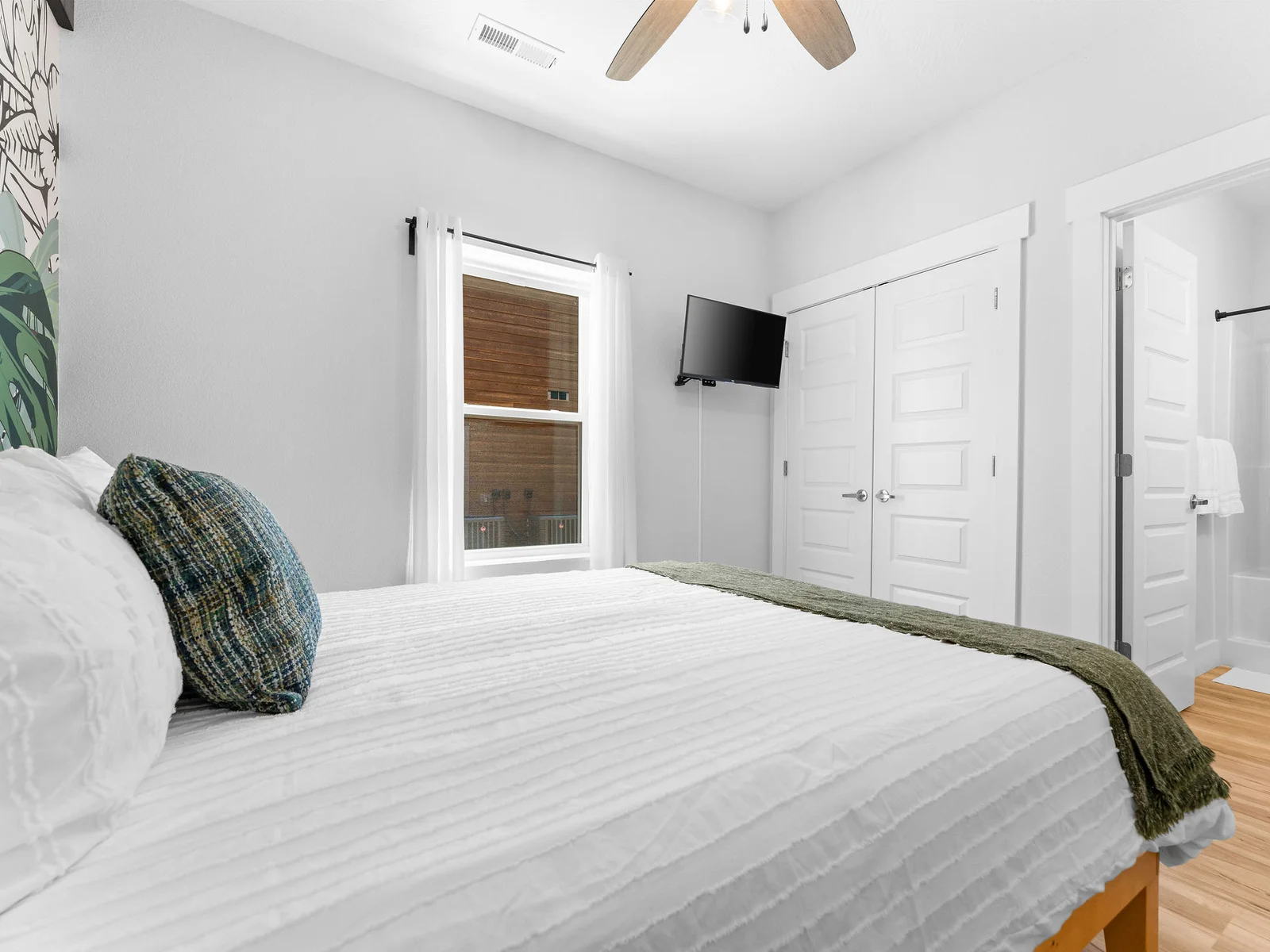 Lower level queen bedroom w/ ensuite bathroom