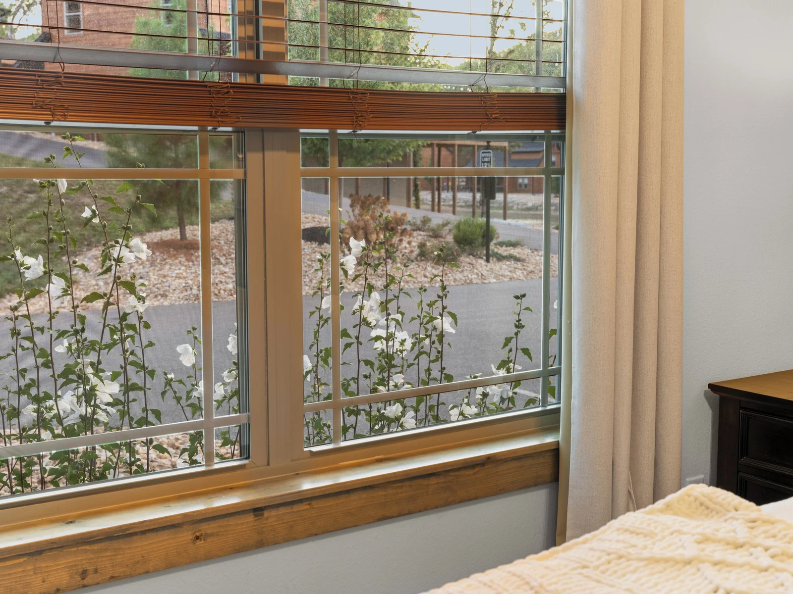 Bedroom, one downstairs on the left.Great view of blooming flowers.