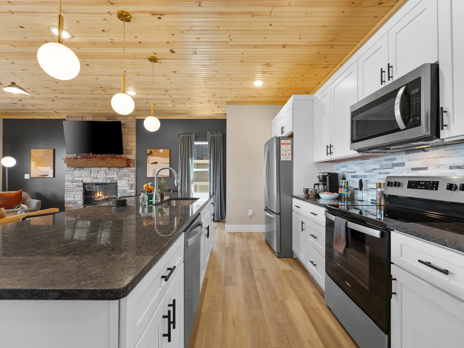 Kitchen: Whip up culinary delights in this stylish kitchen with modern appliances and a scenic view!