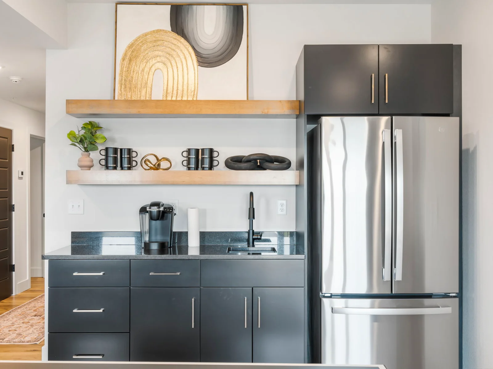 Lower game level wet bar and fridge