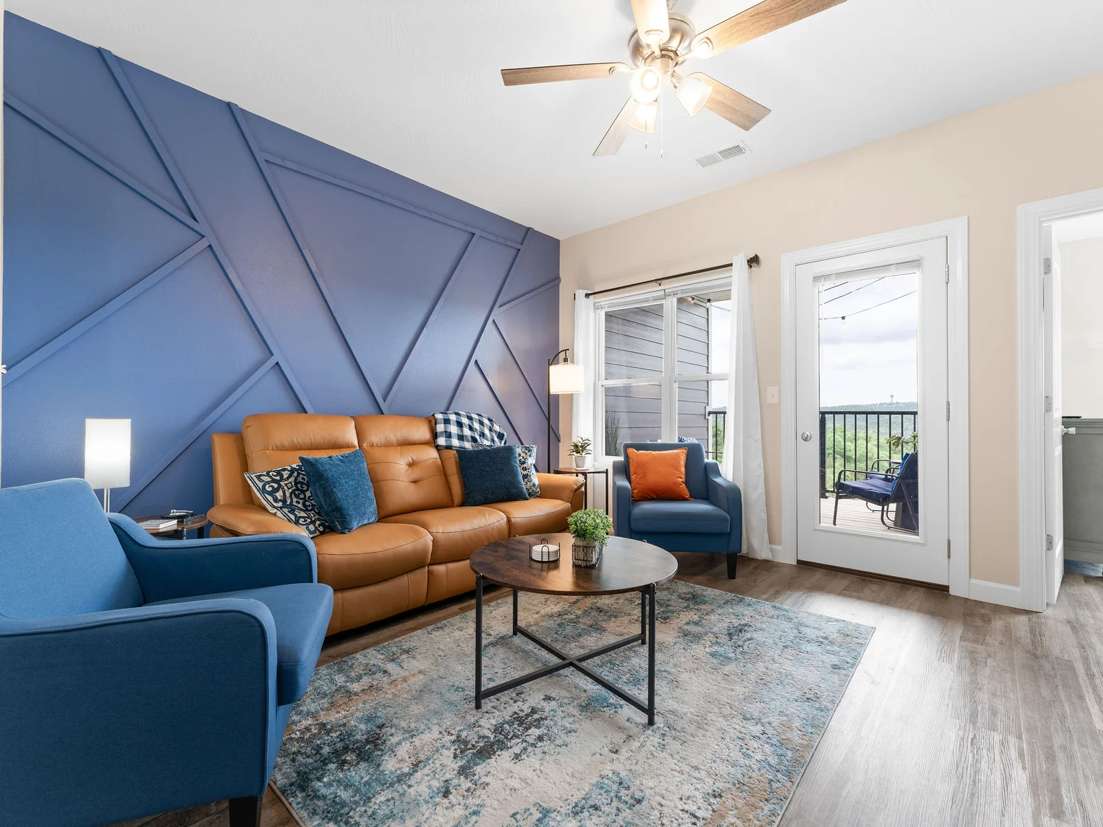 Sink into the reclining sofa with your book, your coffee, and absolutely nowhere to be — the main floor living room is where the slow mornings happen before the day picks up speed. Enjoy panoramic mountain views from the sofa.