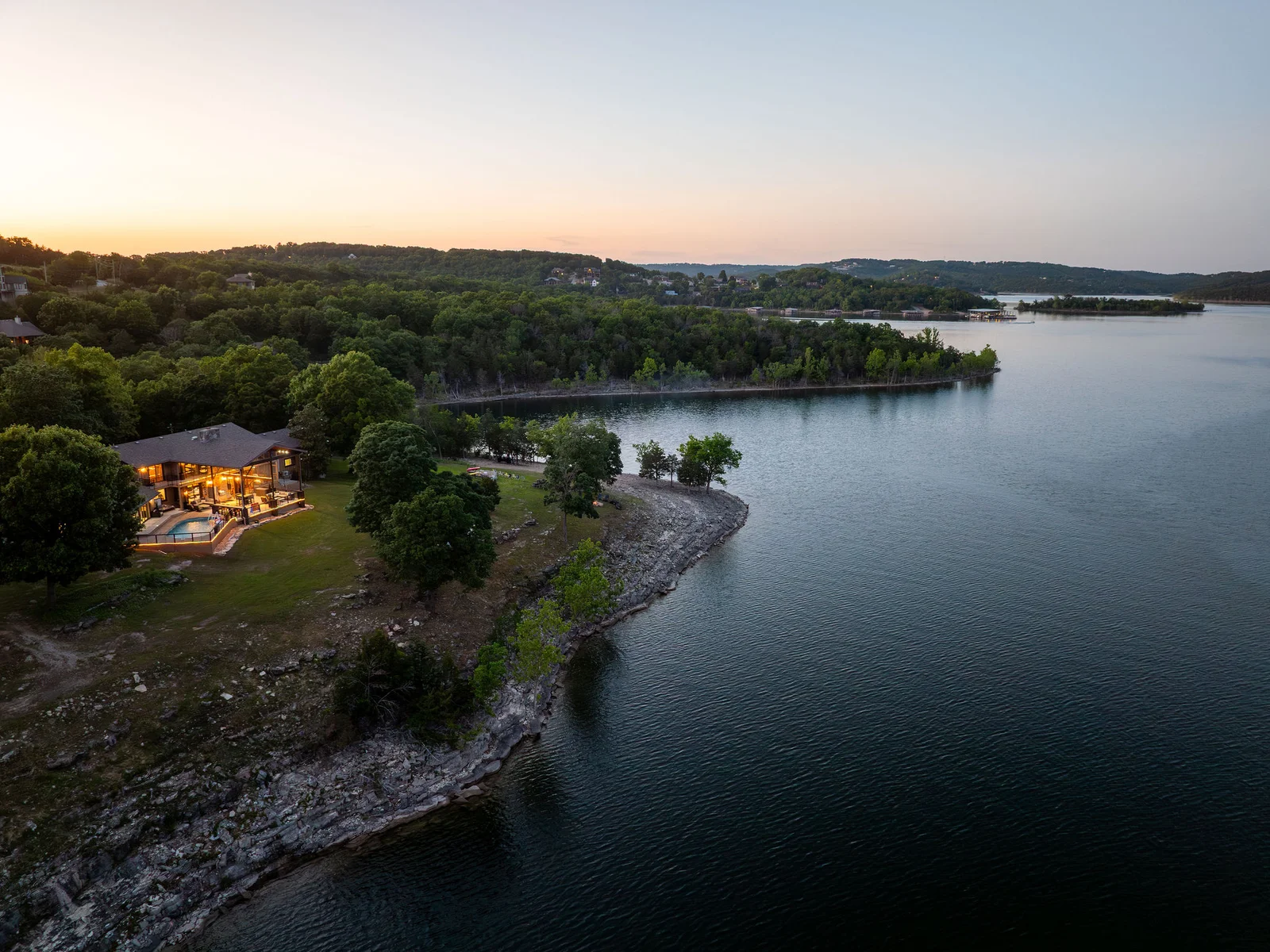 Aerial views capture the beauty of lake life, endless water, peaceful surroundings, and unforgettable sunsets.