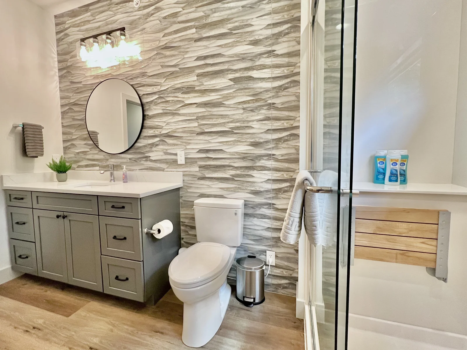 Main level bathroom with walk-in shower, seat, and upgraded heated toilet seat!