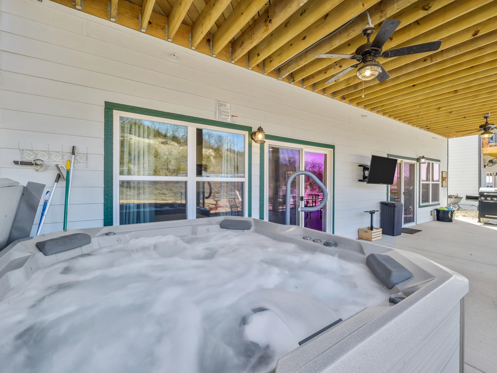 Relax your cares away in the private hot tub