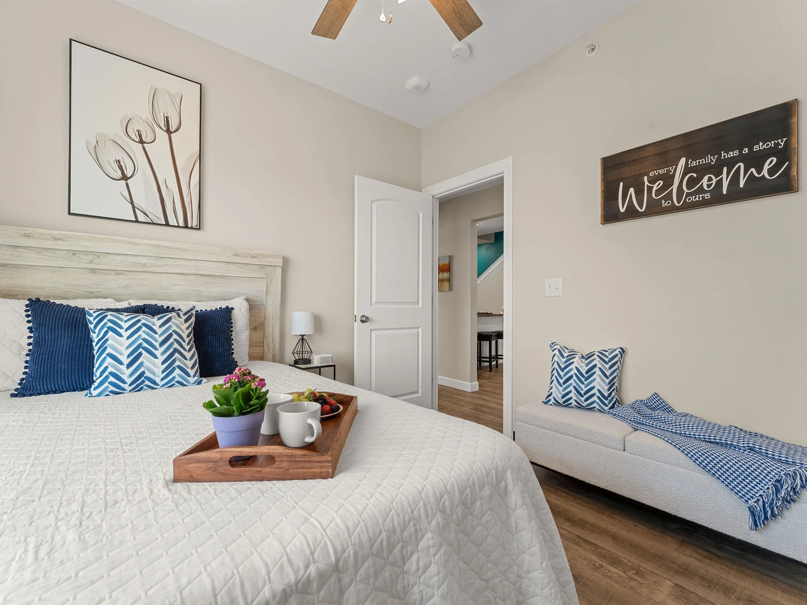 Step into the main level queen bedroom — steps from the kitchen, living room, and front door.