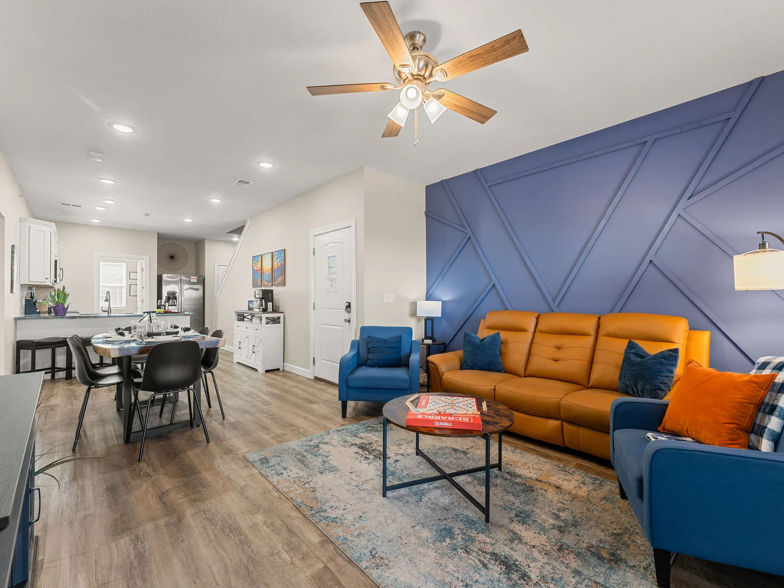 Cook, eat, and relax without leaving this one open space — the main floor flows from kitchen through dining into the living room so you stay part of the conversation no matter where you are.