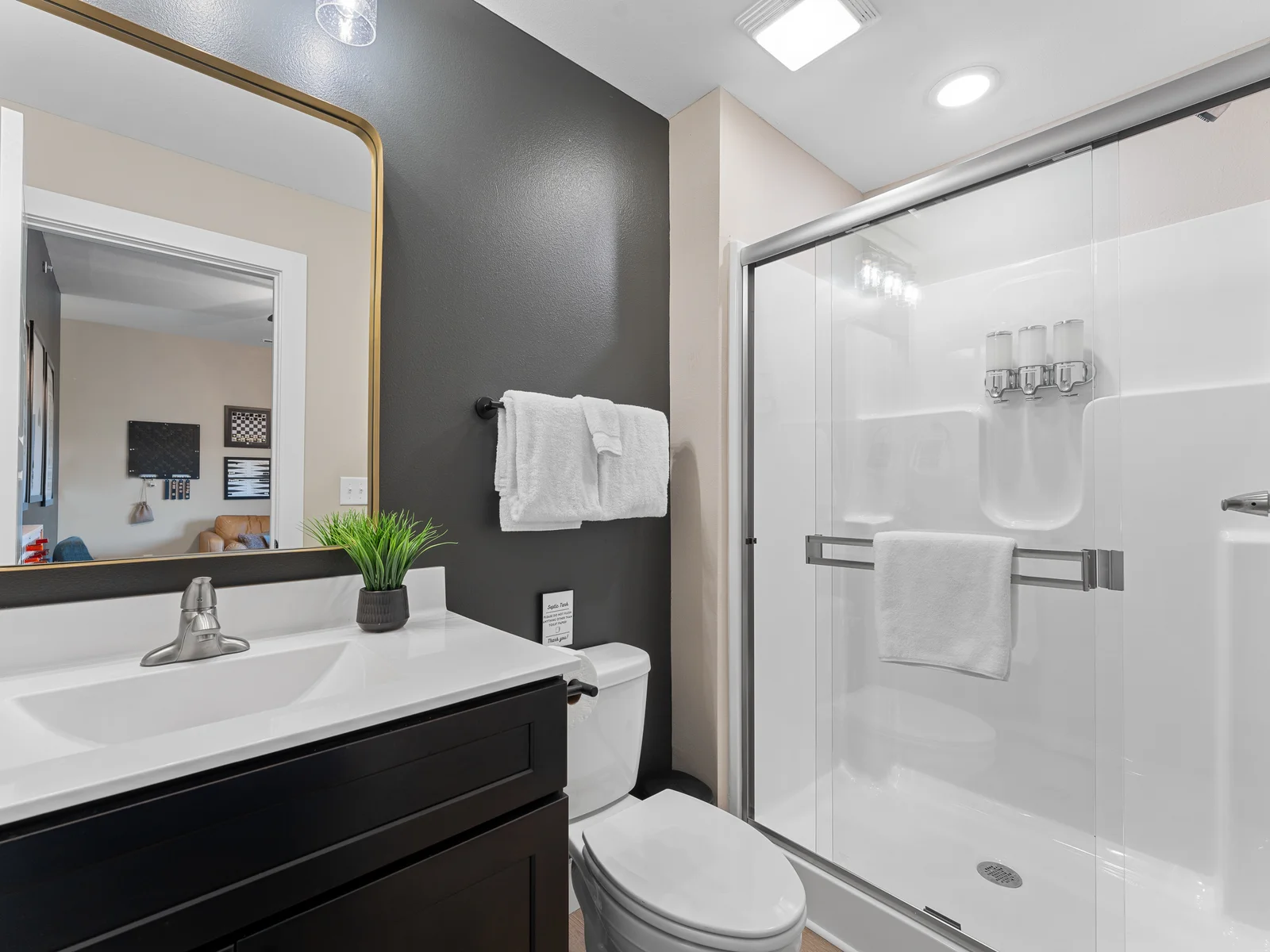 Bathroom Oasis: Refresh in this sleek bathroom featuring modern fixtures and stylish decor!