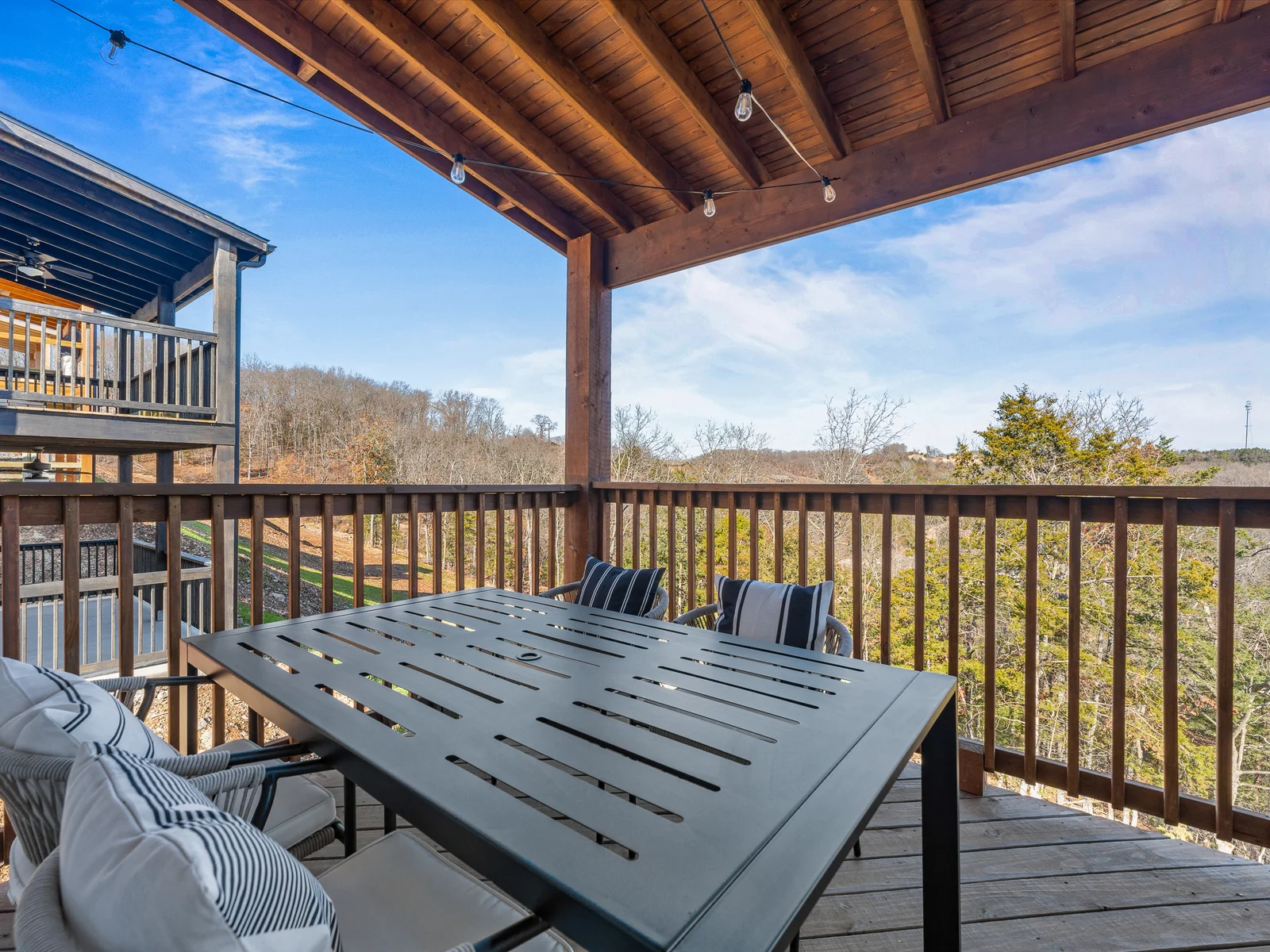 Deck Paradise: Enjoy meals with stunning views and string lights for evening magic!