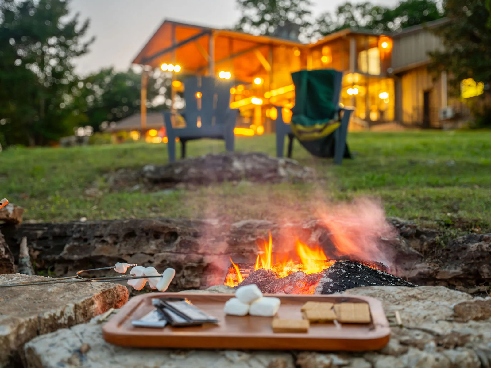 End the day around the fire with cozy seating, glowing sunsets, and unforgettable lakeside memories.