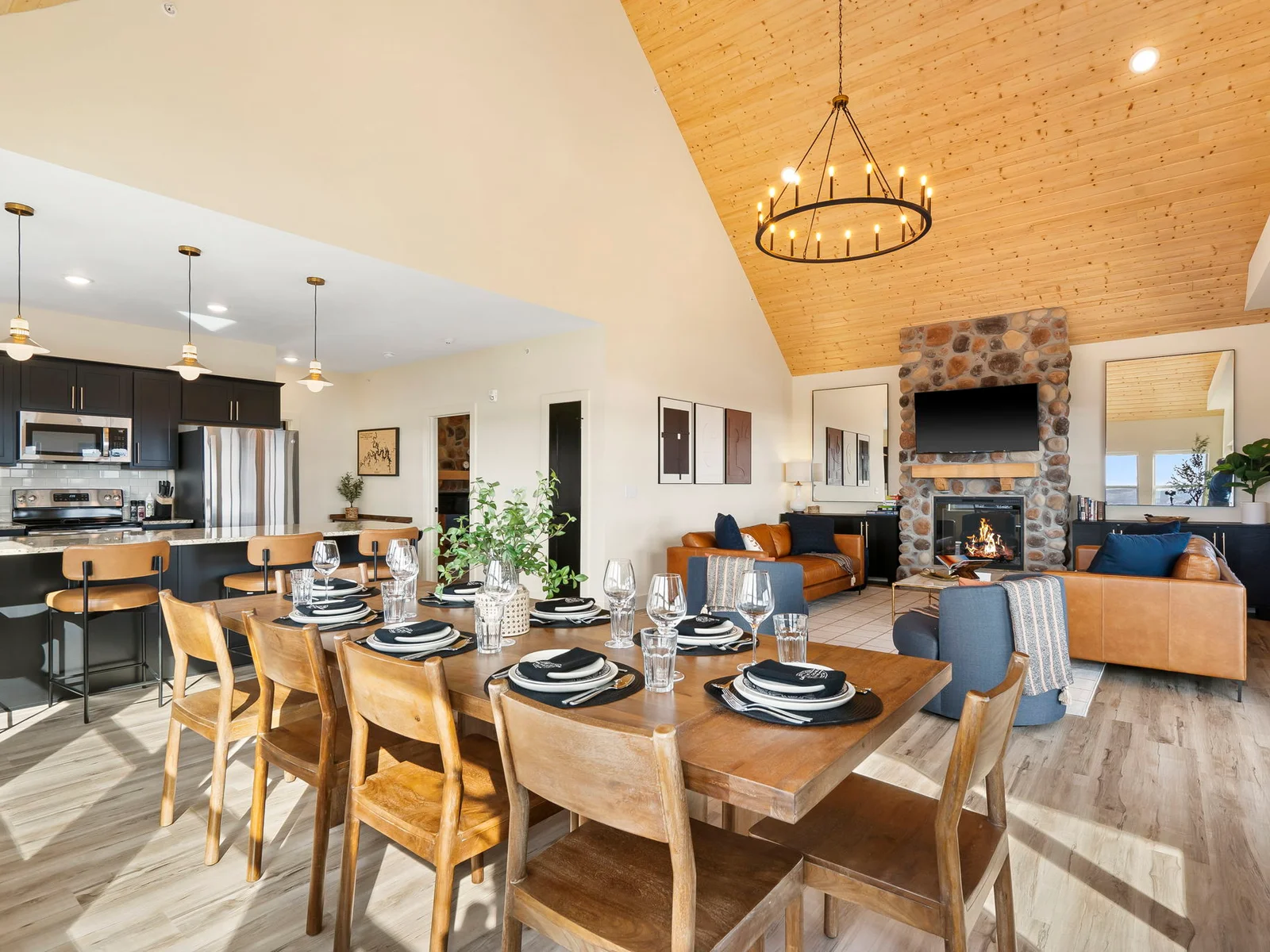 Main living spaces are on the upper floor of this home: Open kitchen with dining seating for the whole family!