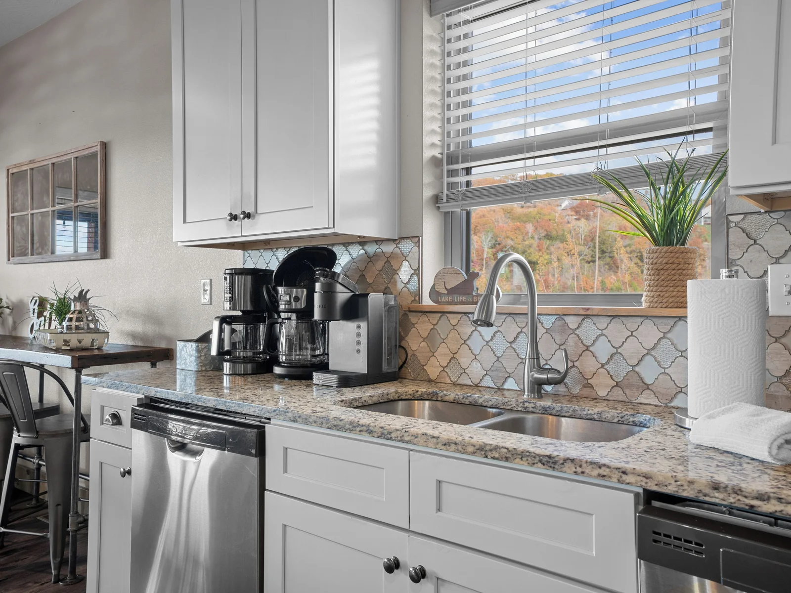 Main level kitchen. Two full-size refrigerators, two dishwashers, oven/ceramic glass cooktop, microwave, drip coffee maker, Keurig, and Nespresso. Stocked with small appliances, cookware, bakeware, utensils, dishes, glassware, mugs, and more!