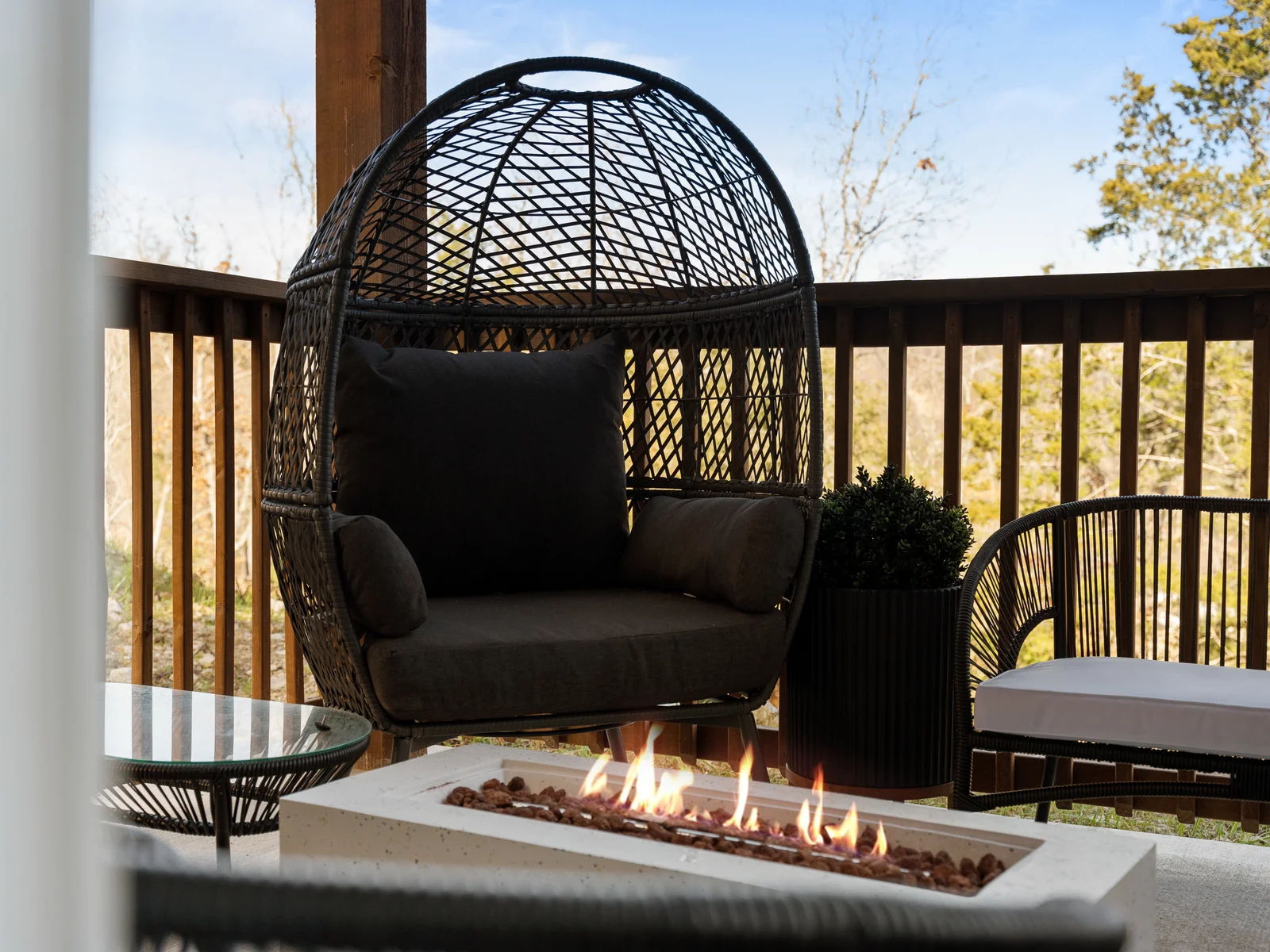 Outdoor Retreat: Nestle into the chic egg chair by the fire pit for starlit conversations!