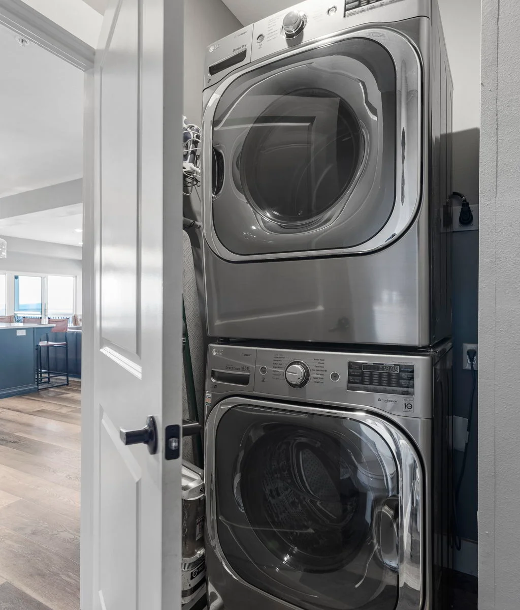 Stacked washer and dryer in main floor 1/2 bath